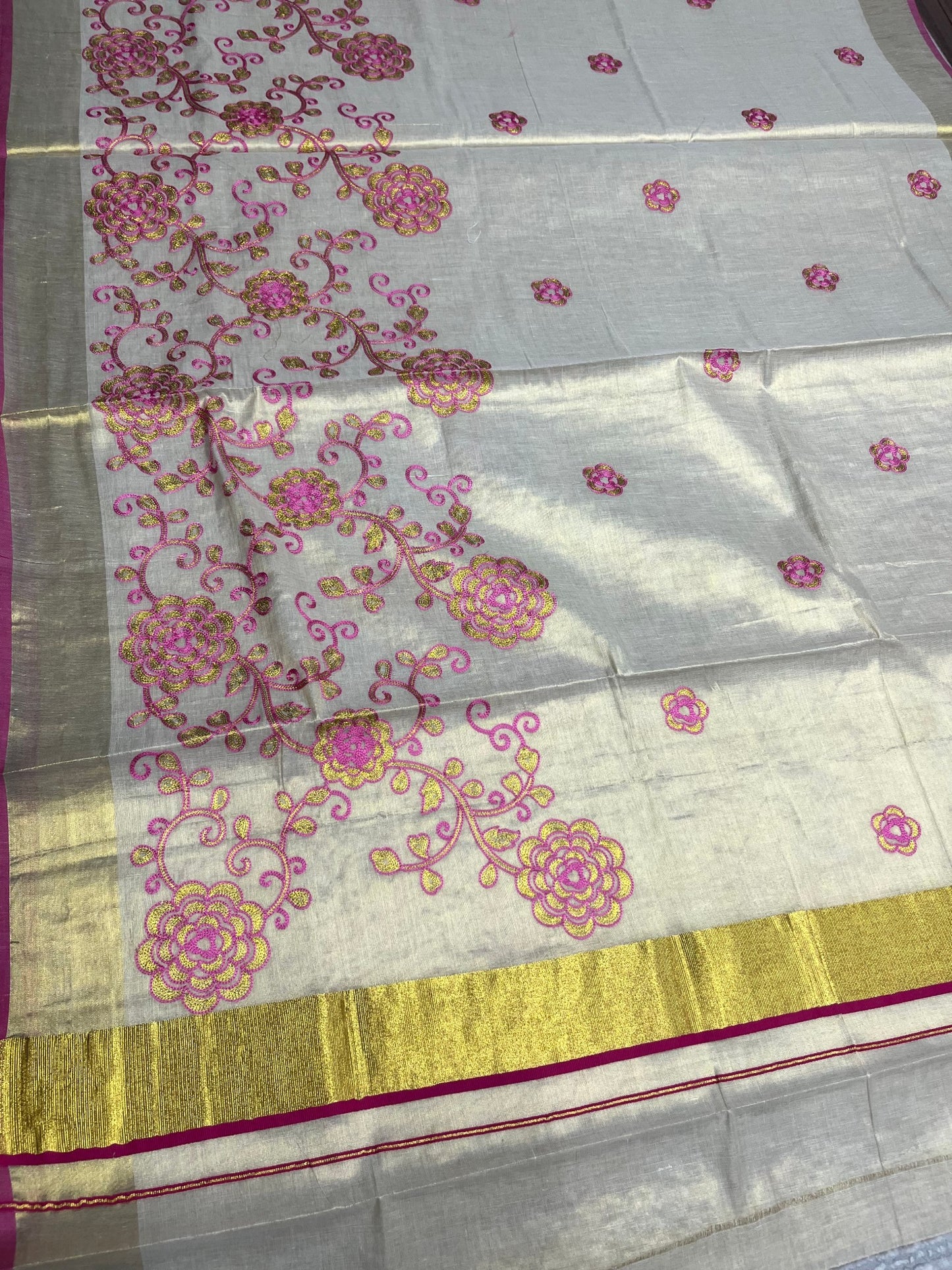 Southloom Kerala Tissue Kasavu Saree With Pink and Golden Floral Embroidery Works