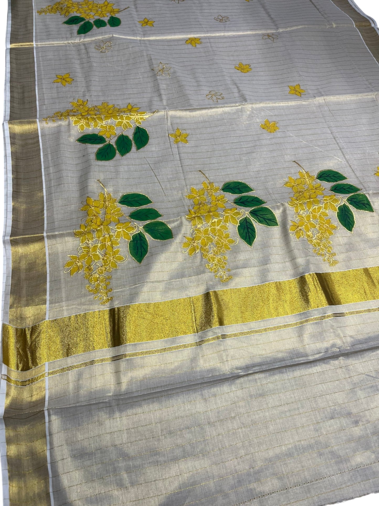 Southloom Tissue Kerala Kasavu Saree with Kanikonna Embroidery Work on Body