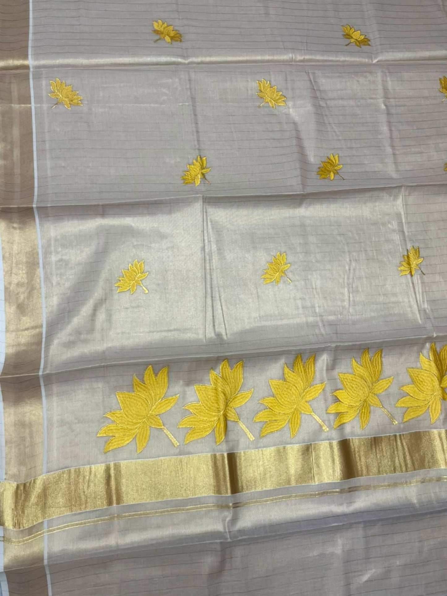 Southloom Kerala Tissue Lines Kasavu Saree with Yellow Lotus Embroidery Works