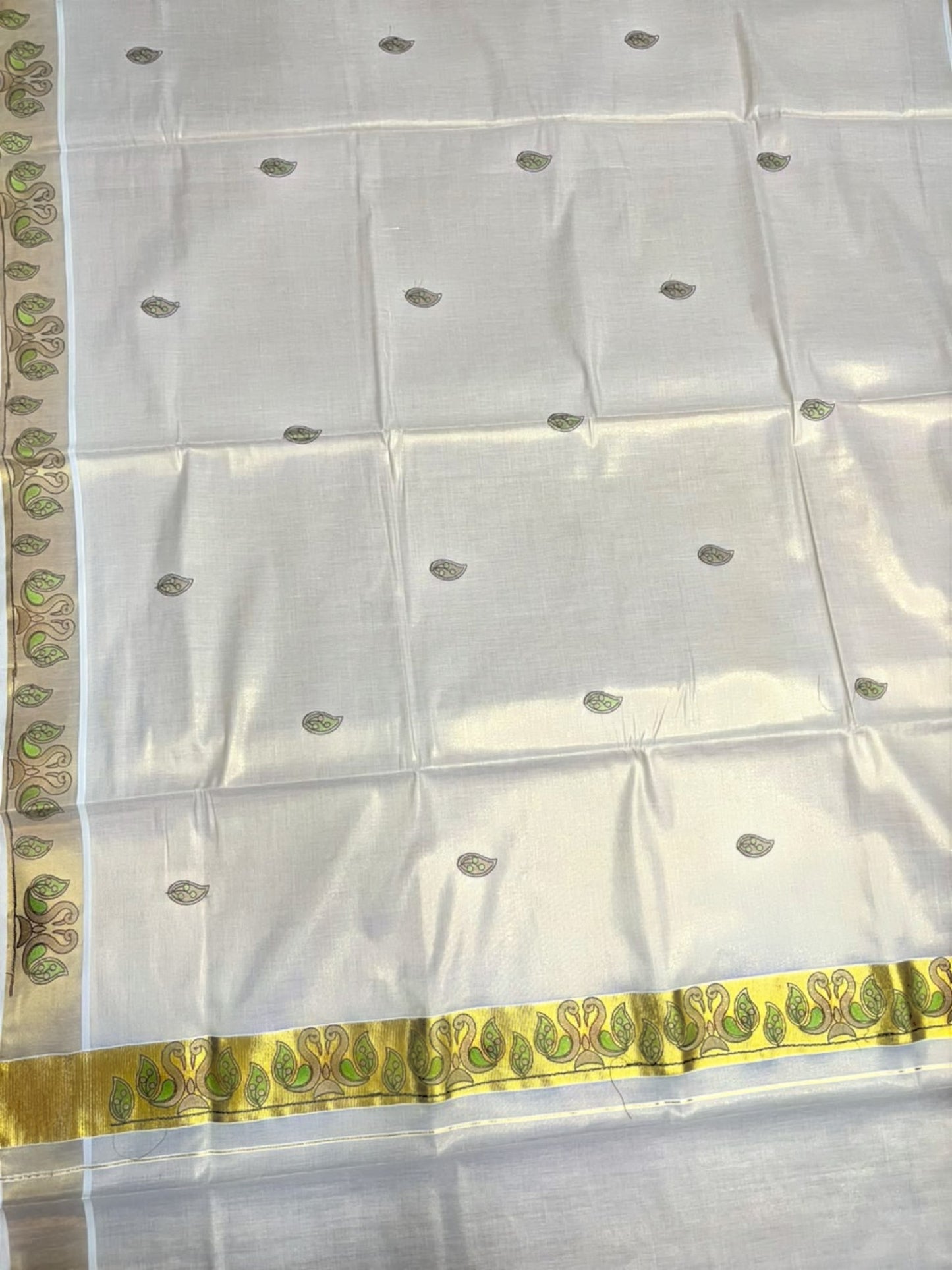 Southloom Tissue Kerala Kasavu Saree with Peacock Embroidery Design On Border