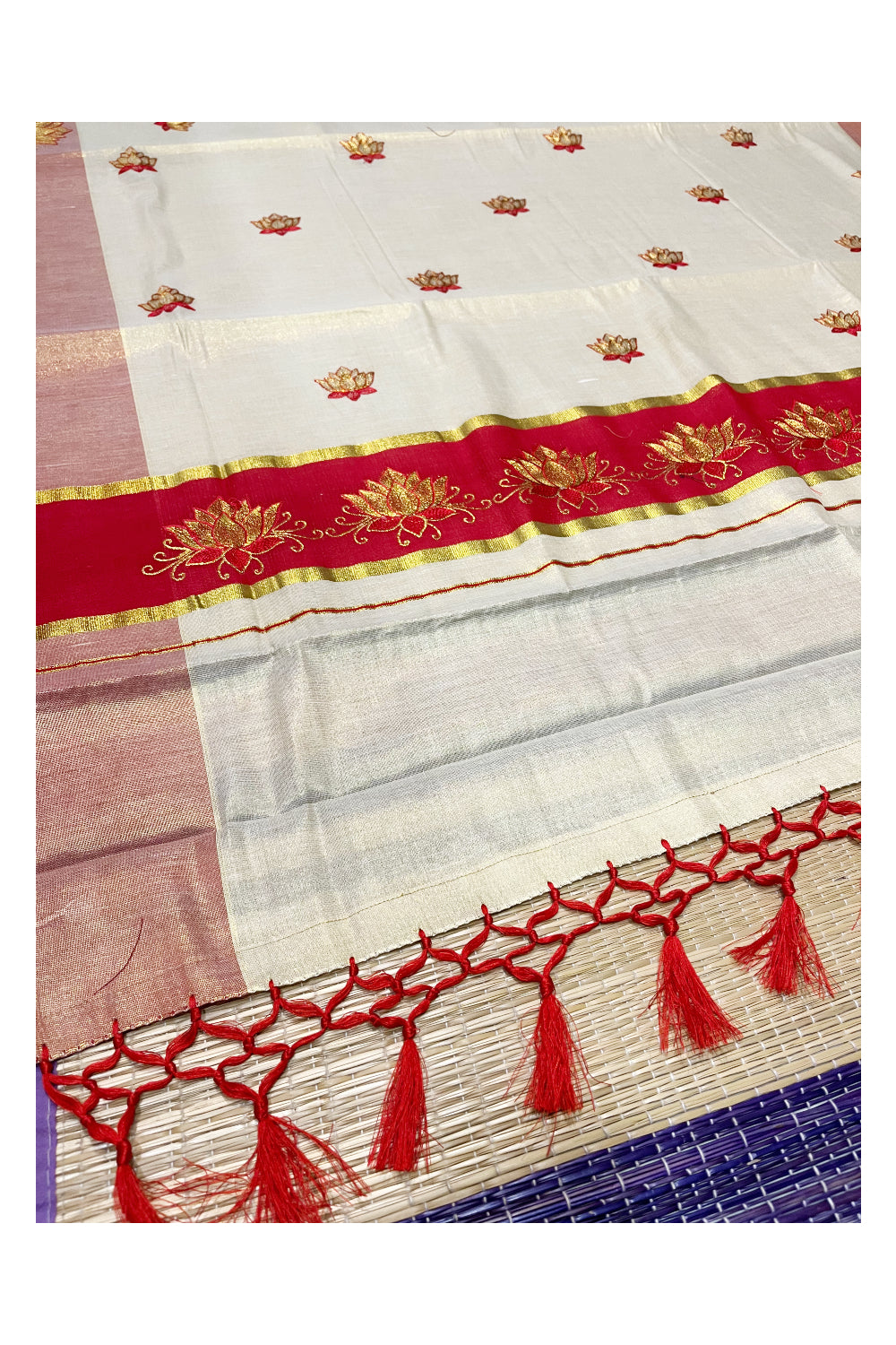 Southloom Kerala Tissue Kasavu Saree with Red And Golden Lotus Embroidary Designs on Body