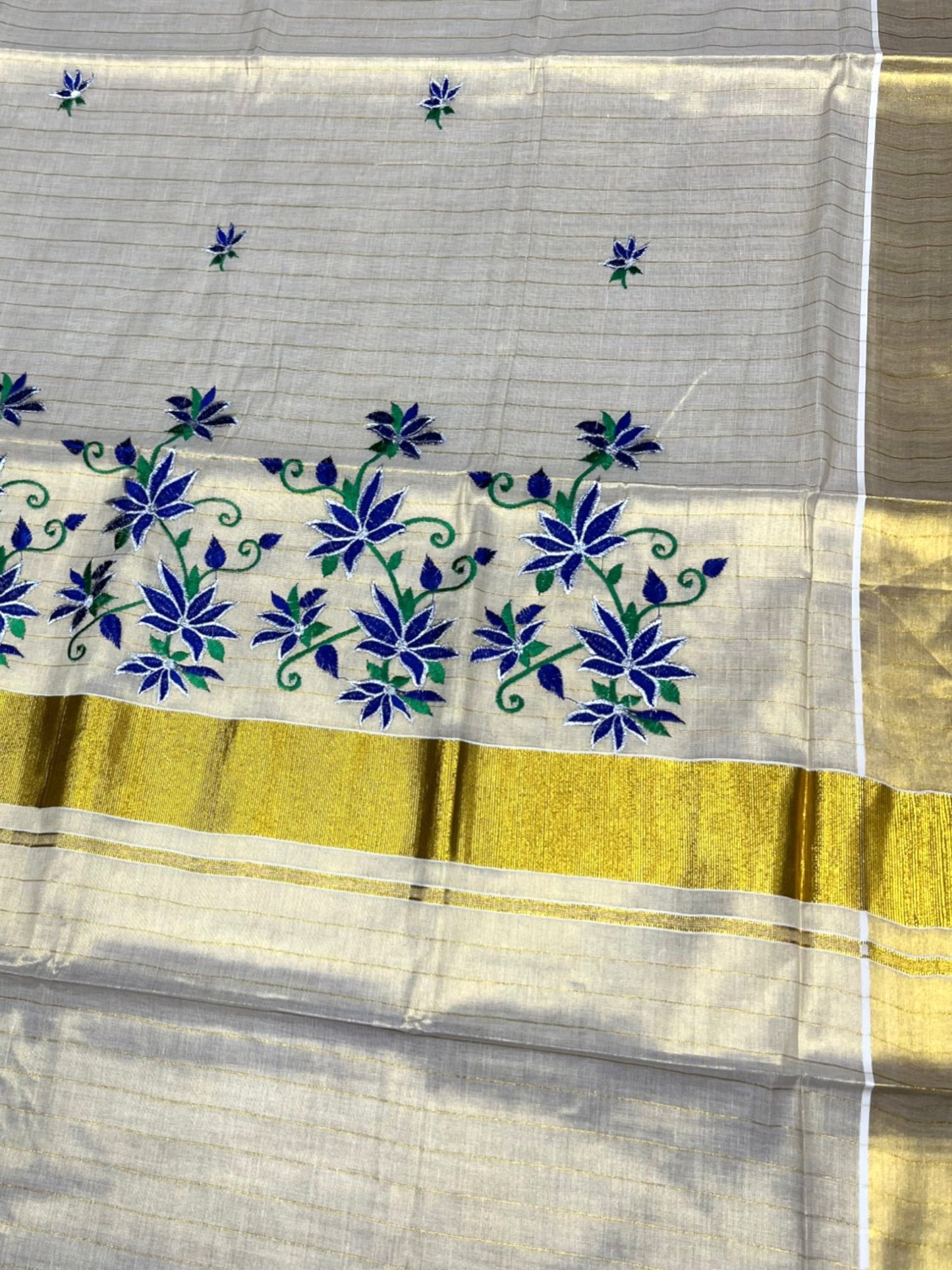 Southloom Tissue Kerala Kasavu Lines Saree with Floral Embroidery Design in Blue