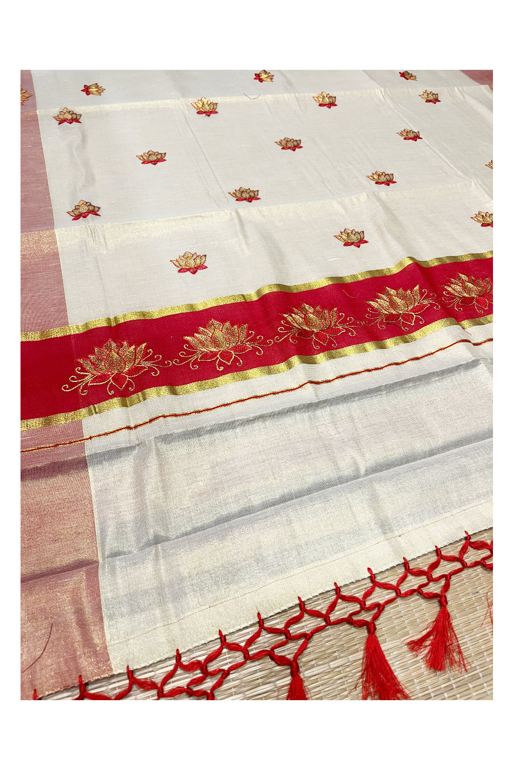 Southloom Kerala Tissue Kasavu Saree with Red And Golden Lotus Embroidary Designs on Body