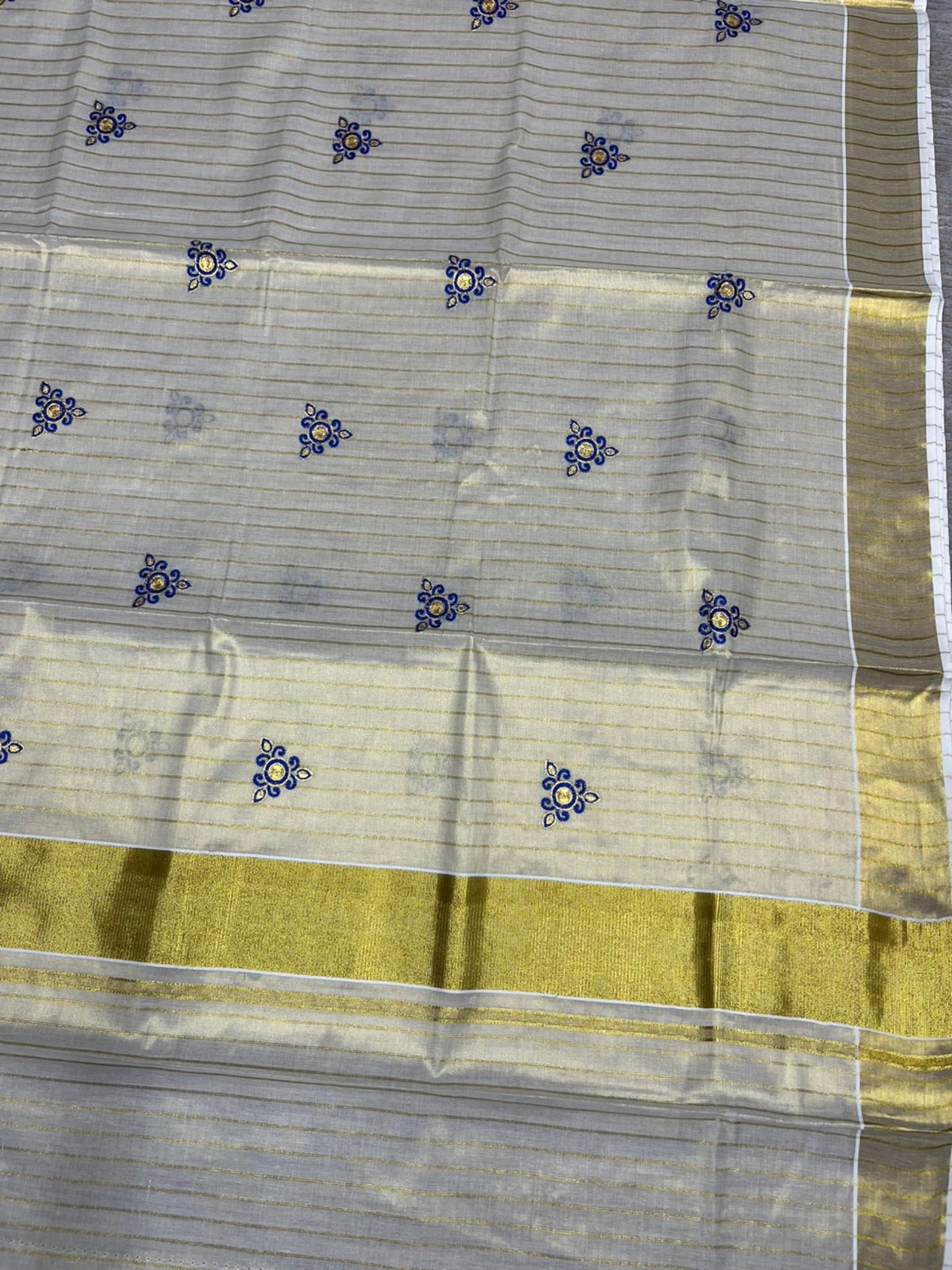 Southloom Tissue Kerala Kasavu Check Saree with Floral Embroidery Design in Blue SL363