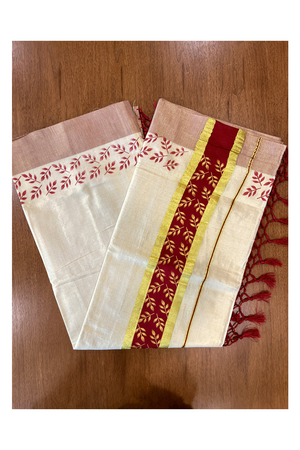 Kerala Tissue Kasavu Saree with Golden and Maroon Block Prints on Border and Tassels Works