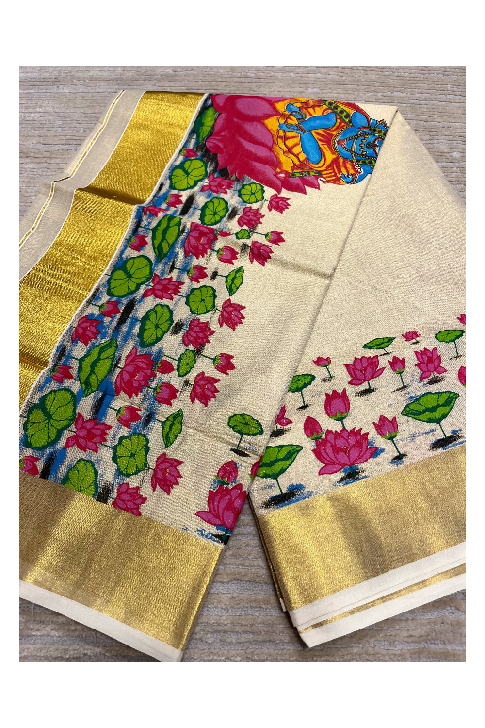 Southloom Tissue Kerala Kasavu Saree with Lotus Handpainted Design
