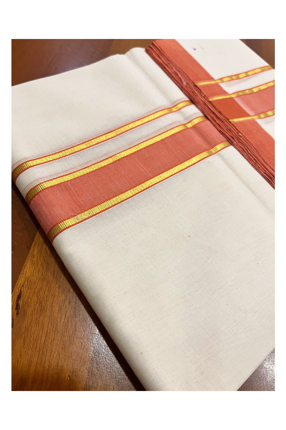 Southloom Premium Balaramapuram Unakkupaavu Handloom Kasavu Mundu with Orange Border (South Indian Kerala Dhoti)