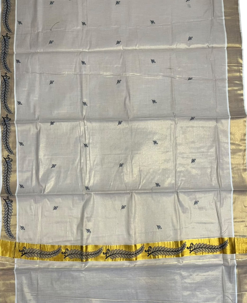 Southloom Tissue Kerala Kasavu Saree with Floral Embroidery Design On Border
