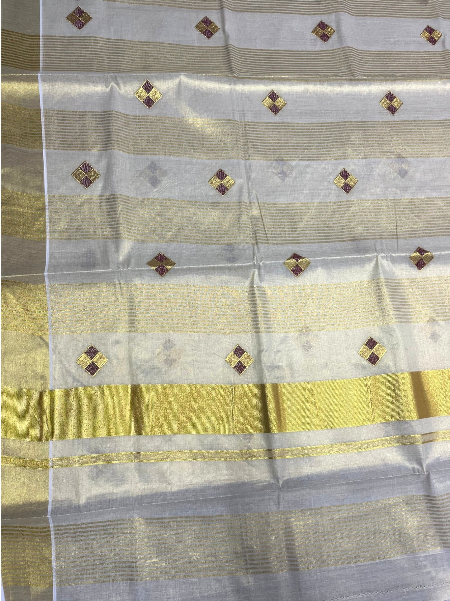Southloom Kerala Tissue Kasavu Striped Saree with  Diagonal Woven Designs in Maroon And Gold Body Work