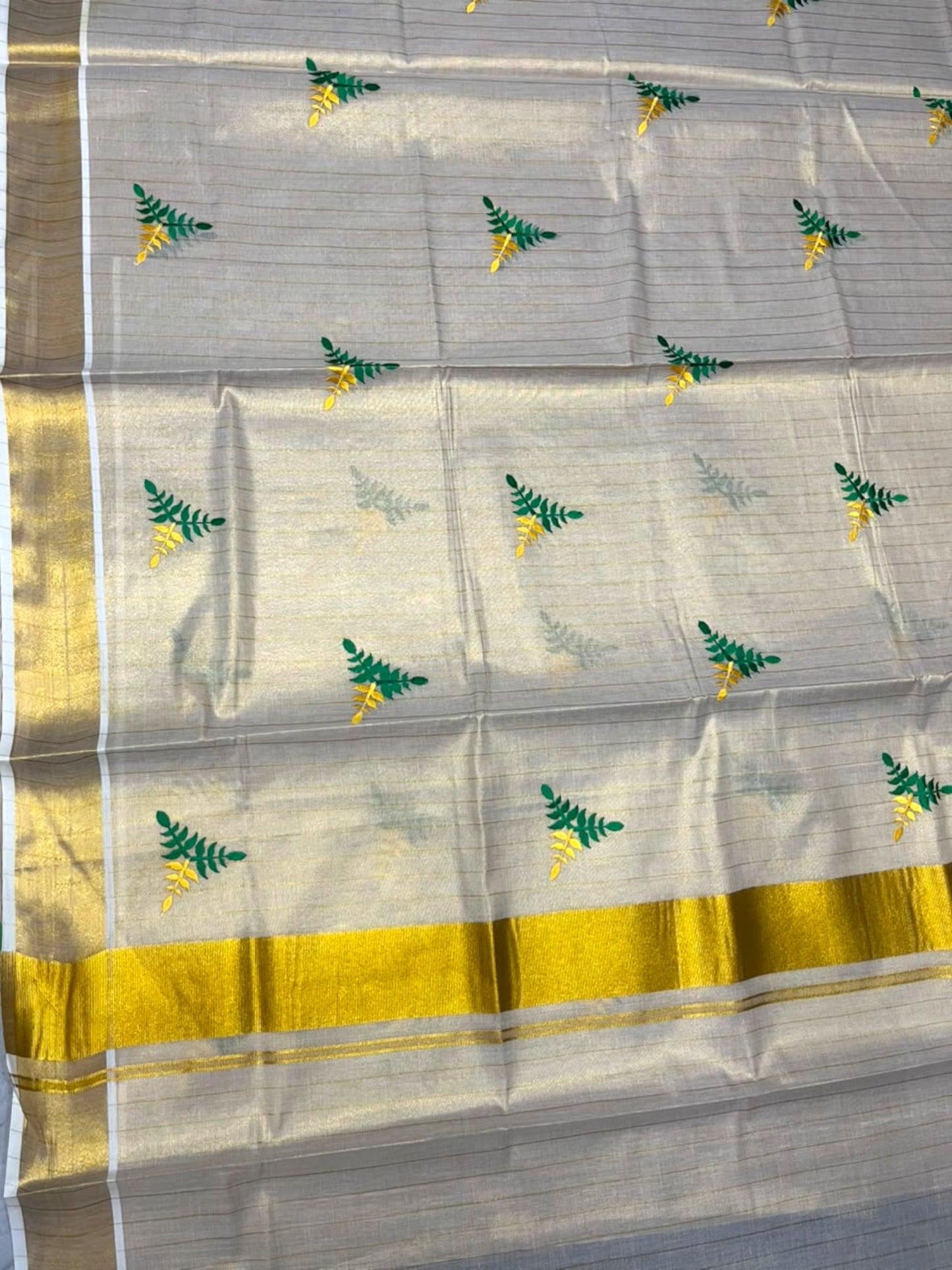 Southloom Kerala Tissue Kasavu Line Saree with Green & Yellow Floral Embroidery Works