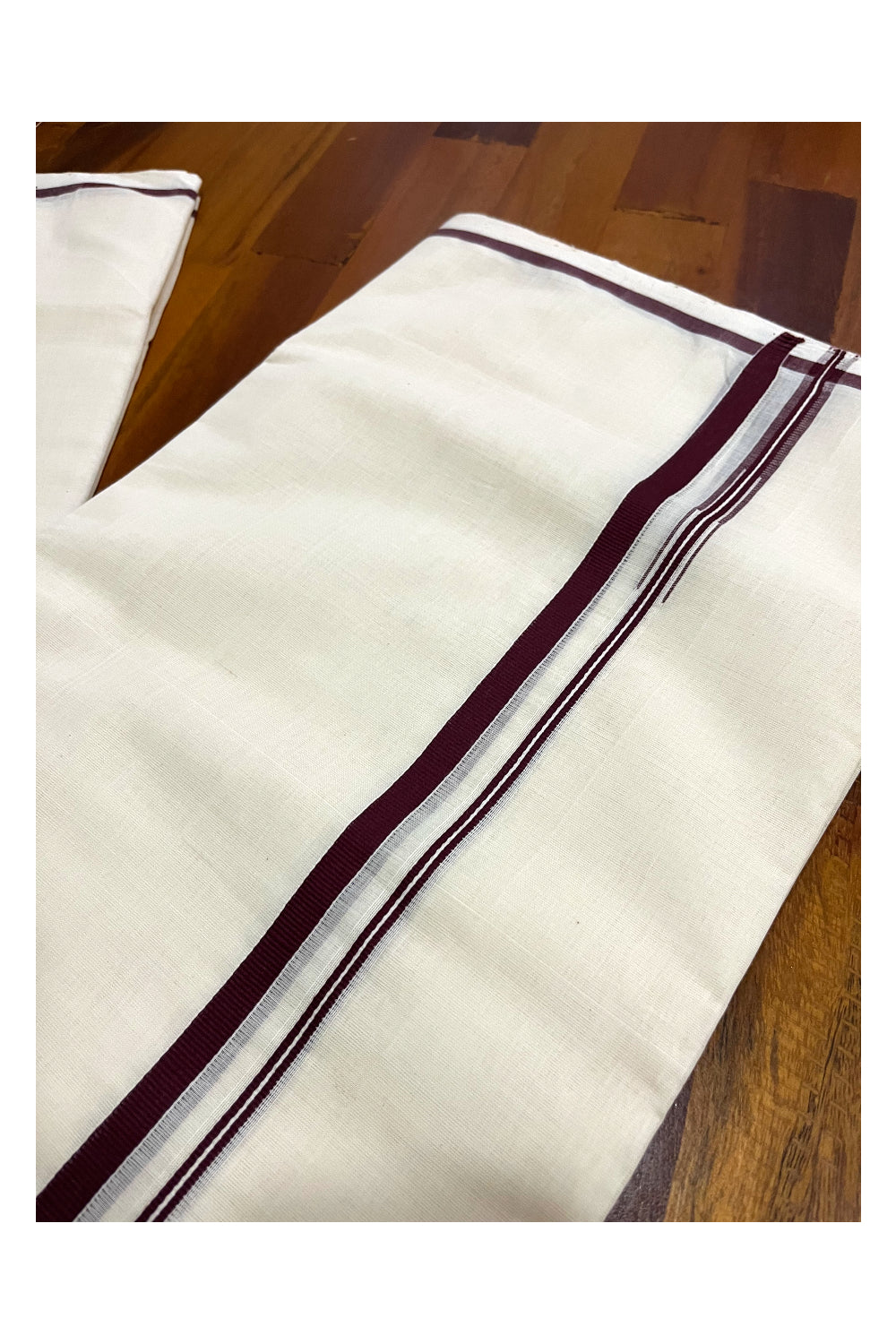 Southloom Premium Handloom Pure Cotton Mundu with Brown Puliyilakkara Border (Onam Mundu 2023)