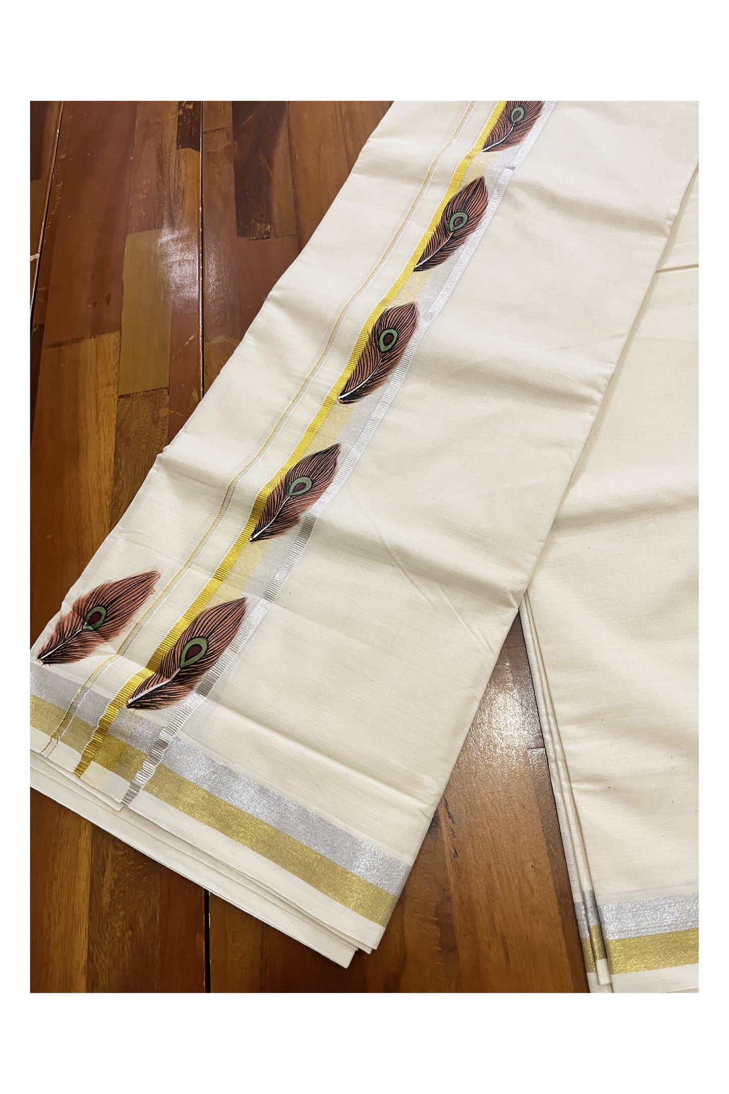 Off White Kerala Cotton Double Mundu with Feather Hand Painted Designs on Silver and Golden Kasavu Border (Vishu 2024 Collection)