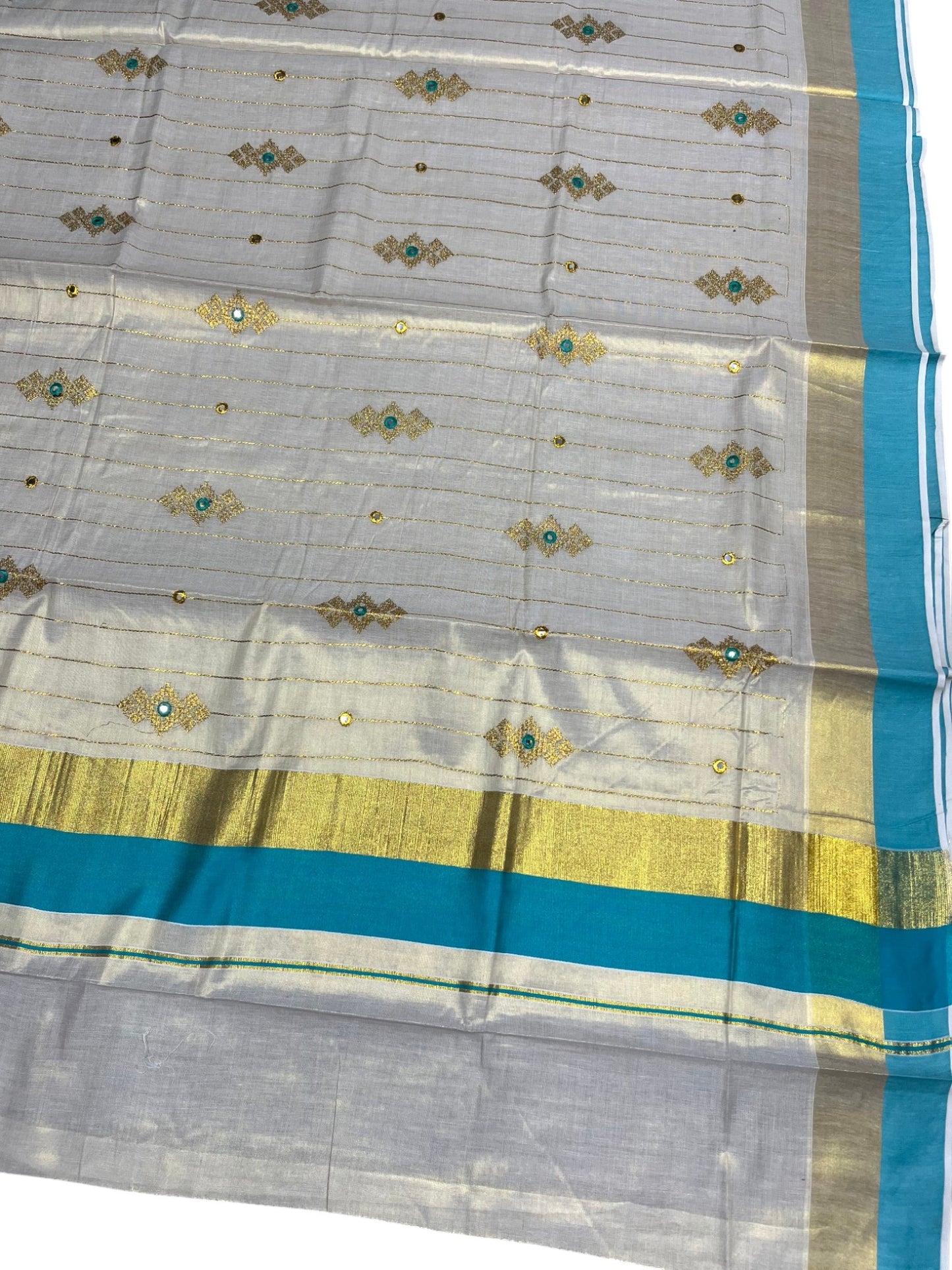 Southloom Kerala Tissue Kasavu Lines Saree with Golden And Turquoise Embroidery Works