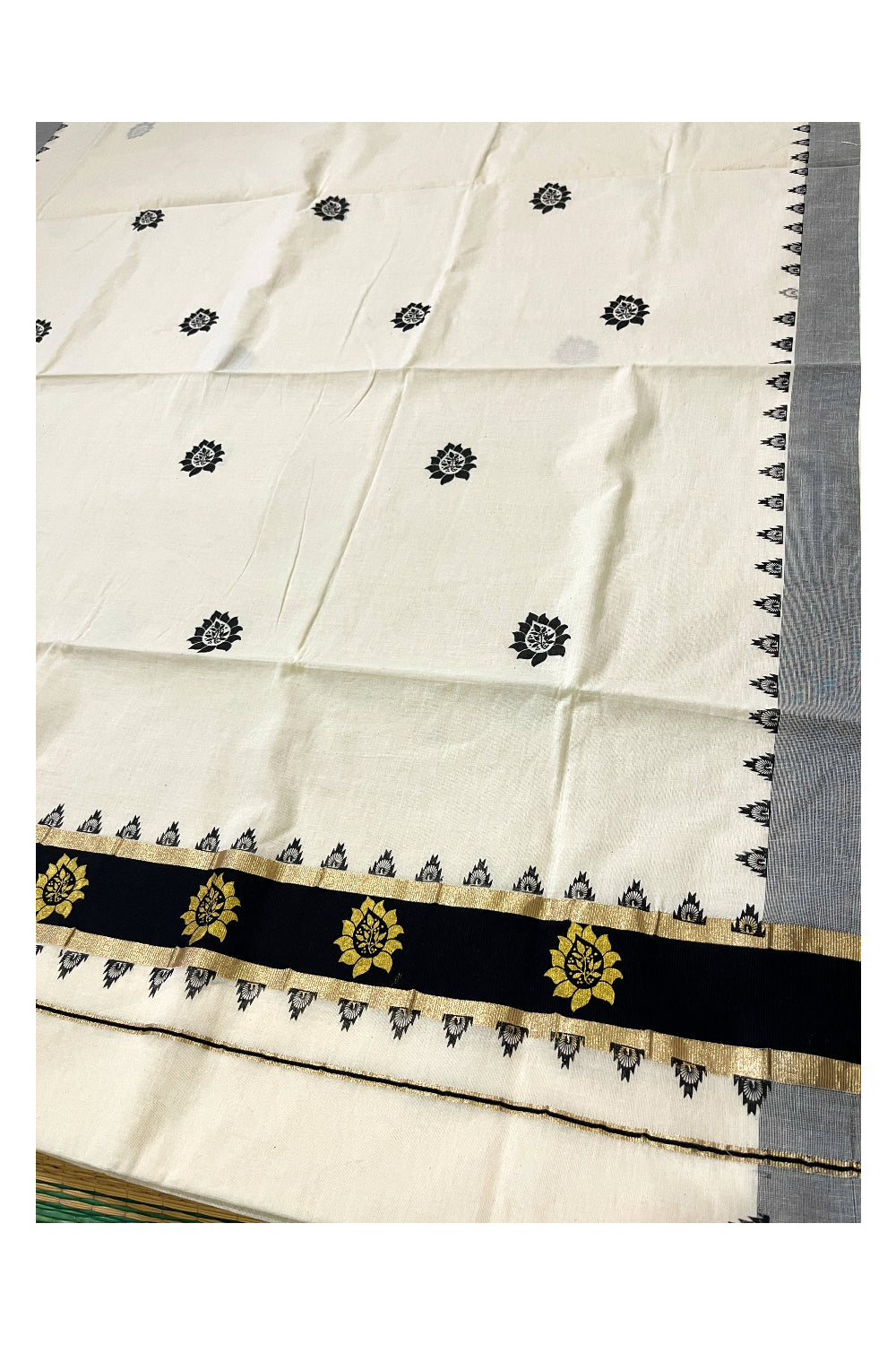 Pure Cotton Kerala Kasavu Saree with Black Floral Block Printed Design