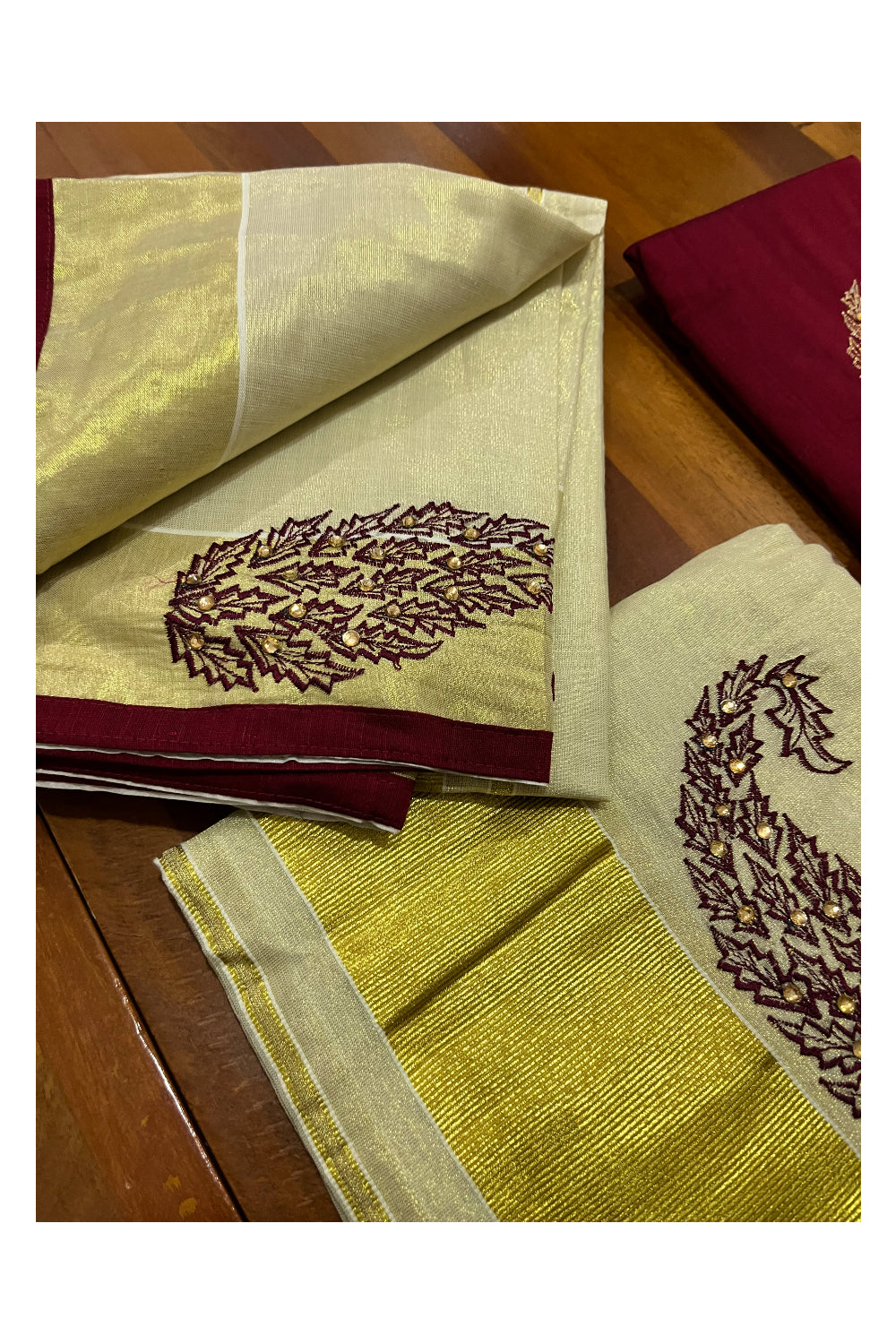 Kerala Tissue Kasavu Set Mundu (Mundum Neriyathum) with Handwork Embroidery Design and Maroon Blouse Piece