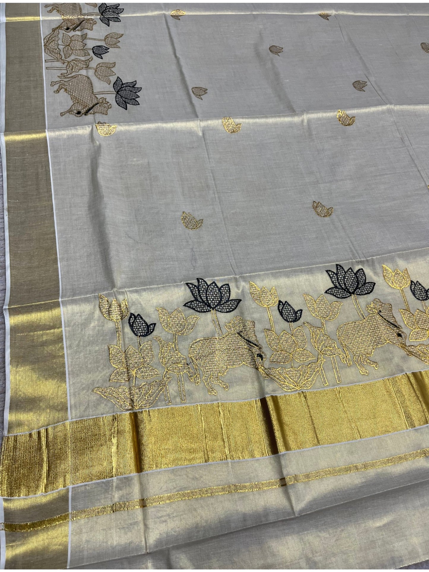 Southloom Tissue Kerala Kasavu Saree with Black & Golden Embroidery Works