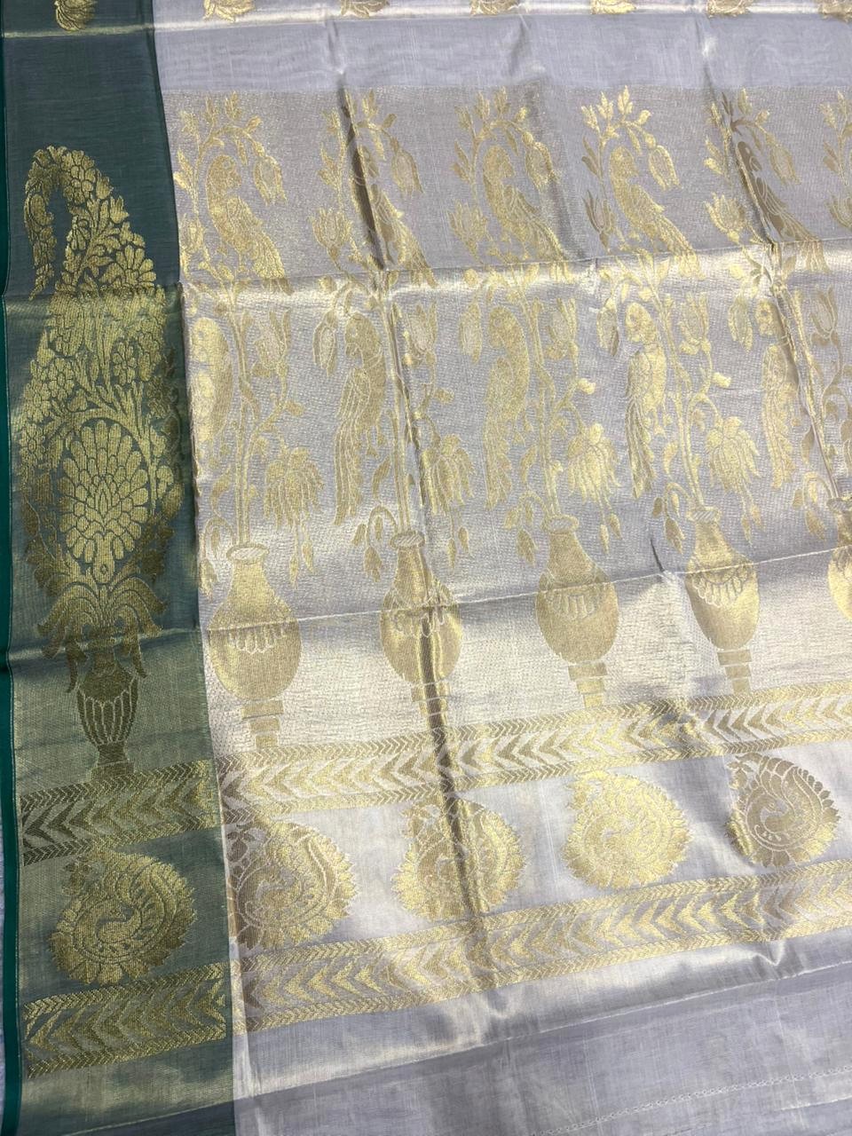 Southloom  Kerala Tissue Kasavu Heavy Work Saree with Peacock Design And Green Border SL483