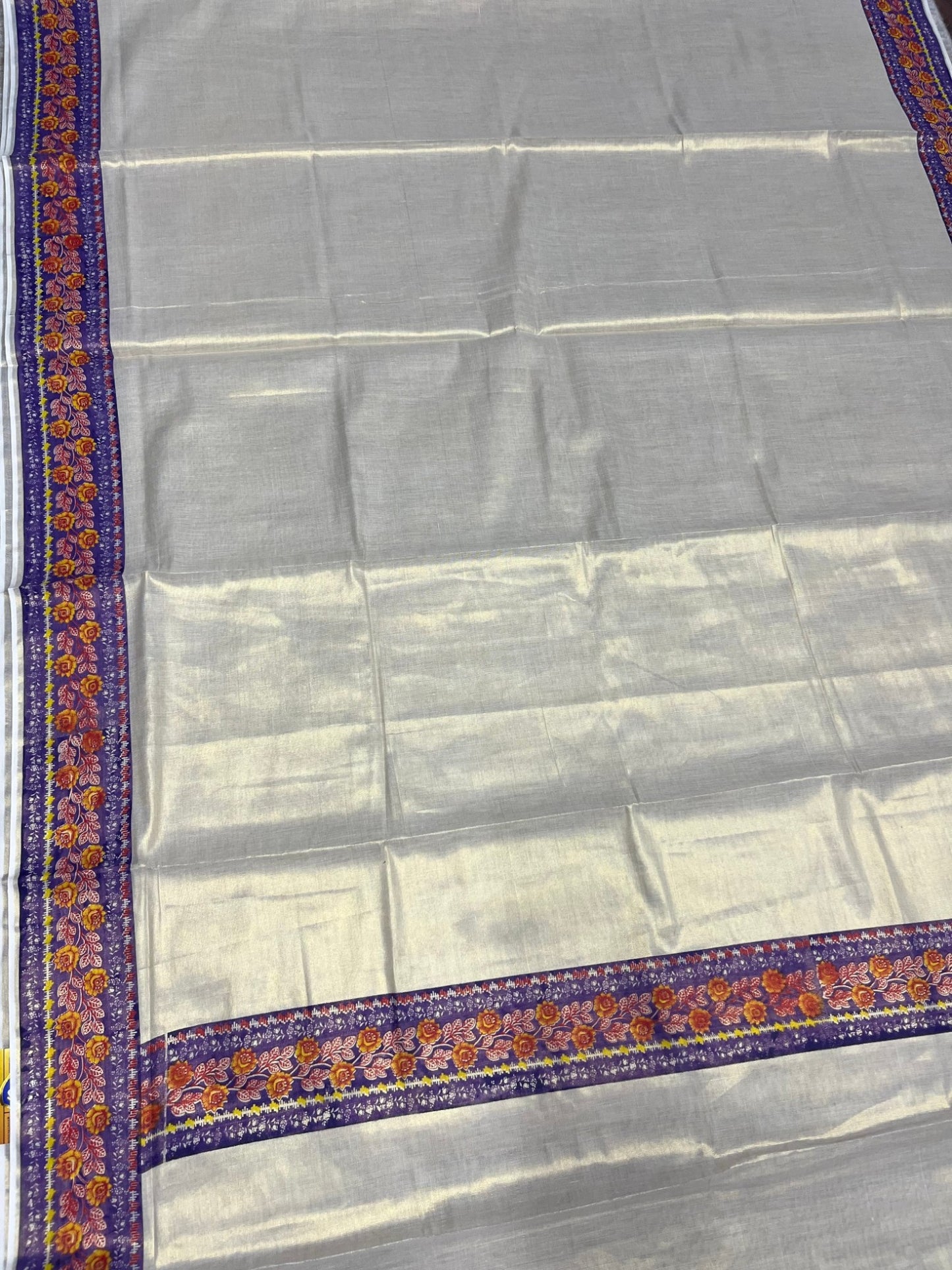 Southloom Kerala Tissue Plain Saree With Floral Digital Prints on Borders