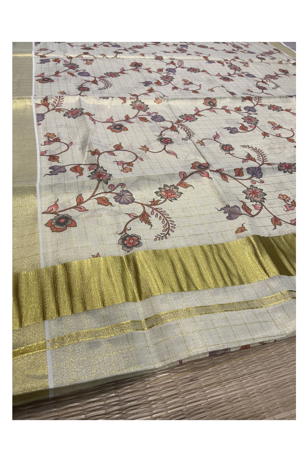 Kerala Tissue Kasavu Check Saree with Floral Kalamkari Design