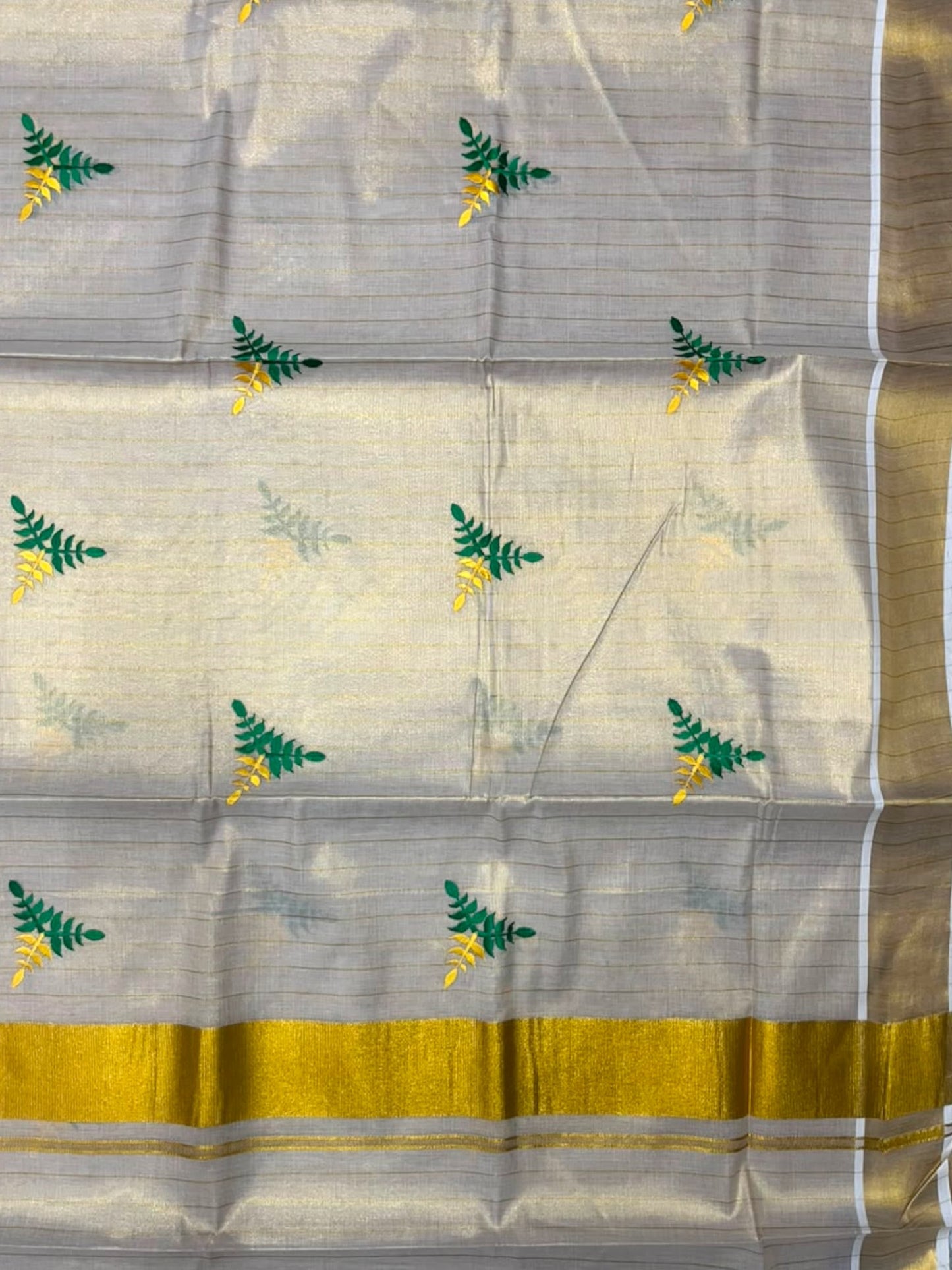 Southloom Kerala Tissue Kasavu Line Saree with Green & Yellow Floral Embroidery Works