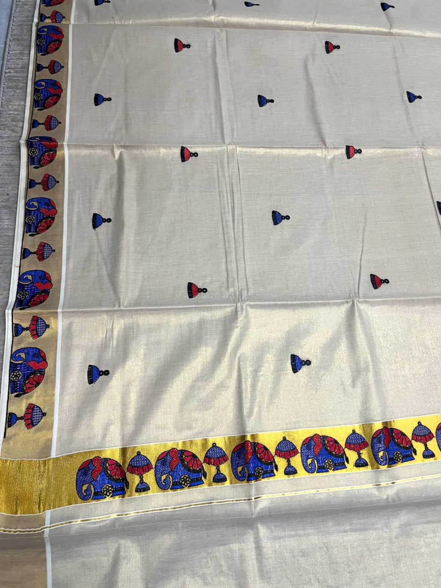 Southloom Tissue Kerala Kasavu Saree with Elephant Embroidery Design