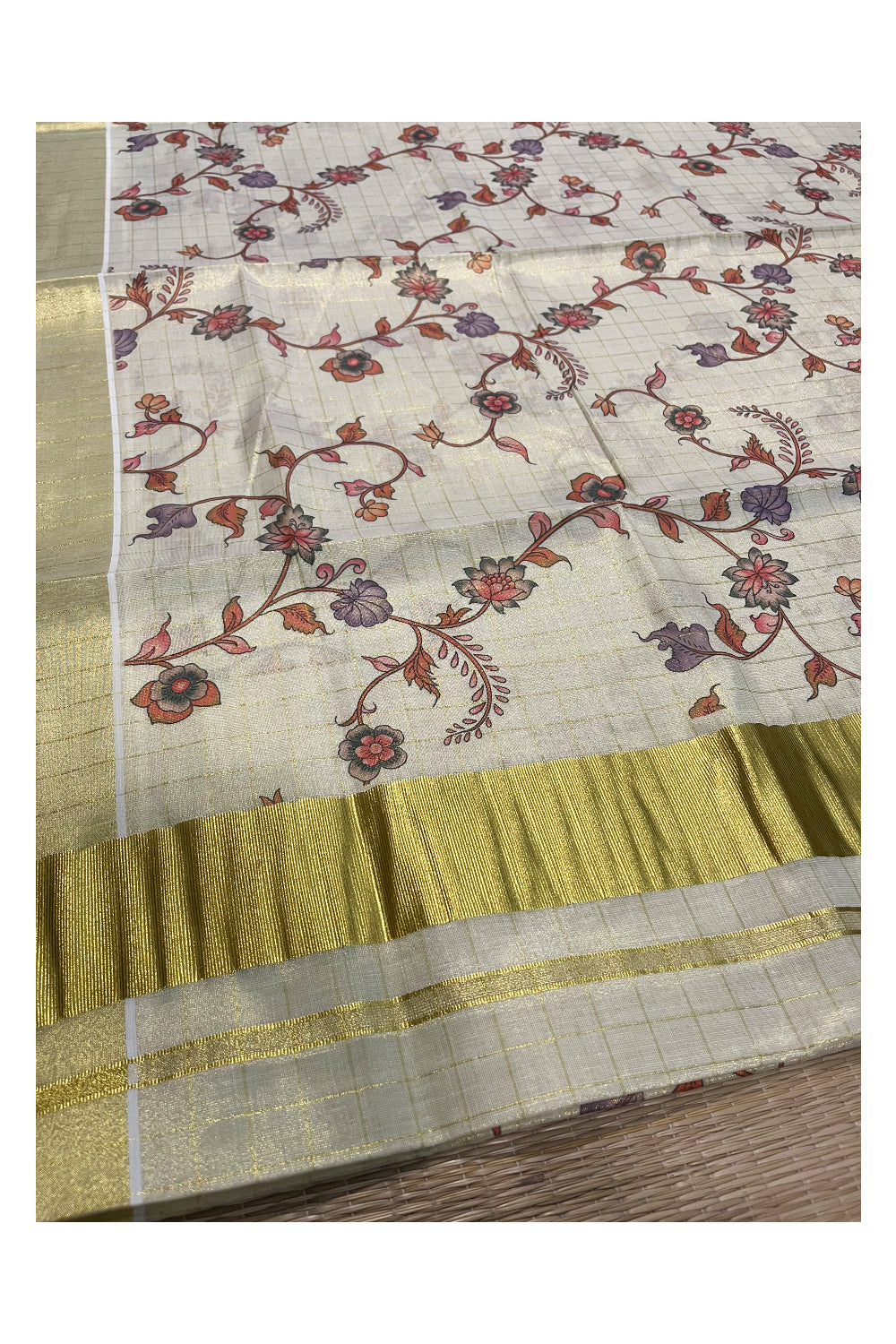 Kerala Tissue Kasavu Check Saree with Floral Kalamkari Design