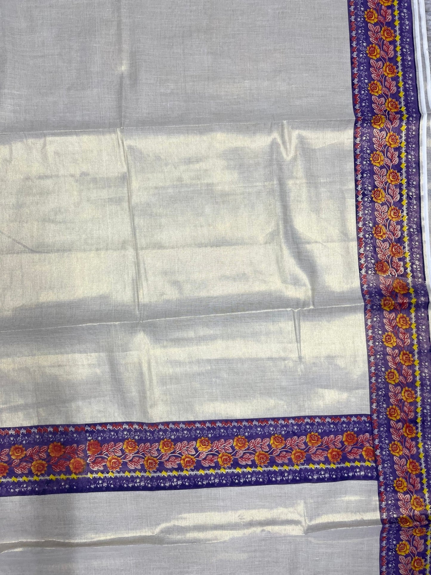 Southloom Kerala Tissue Plain Saree With Floral Digital Prints on Borders