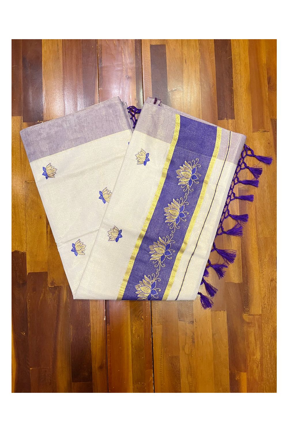 Southloom Kerala Tissue Kasavu Saree with Violet And Golden Lotus Embroidary Designs on Body