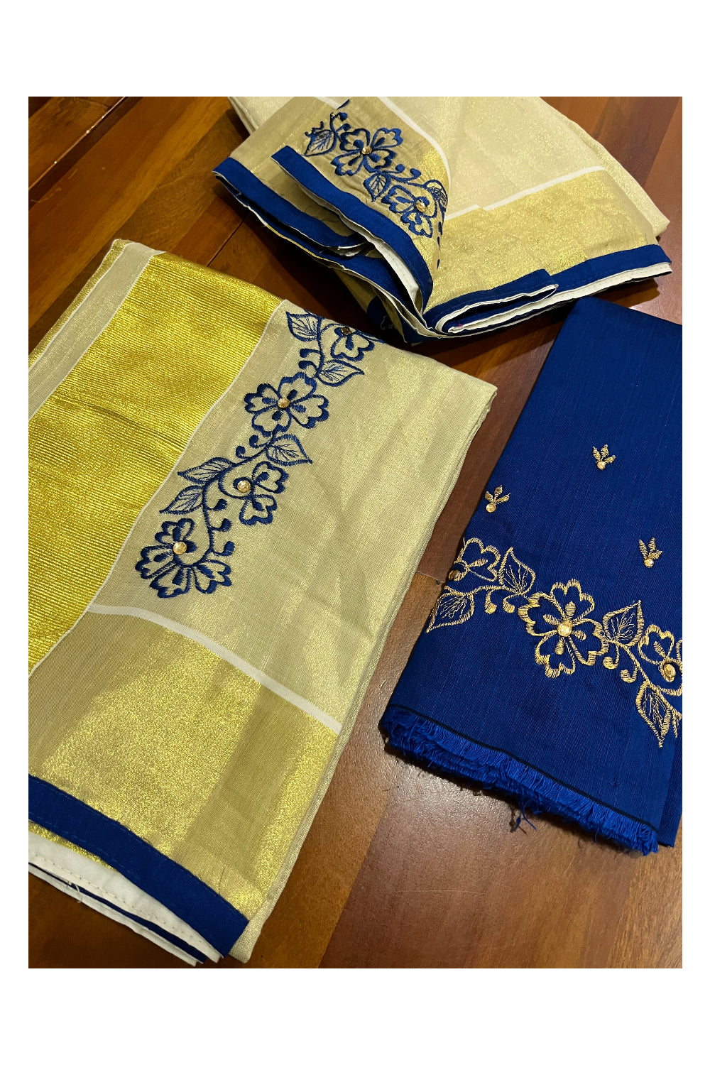 Kerala Tissue Kasavu Set Mundu (Mundum Neriyathum) with Handwork Embroidery Design and Blue Blouse Piece