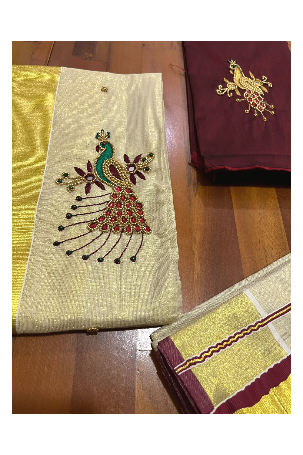 Kerala Tissue Kasavu Set Mundu (Mundum Neriyathum) with Bead Handwork Design and Maroon Blouse Piece