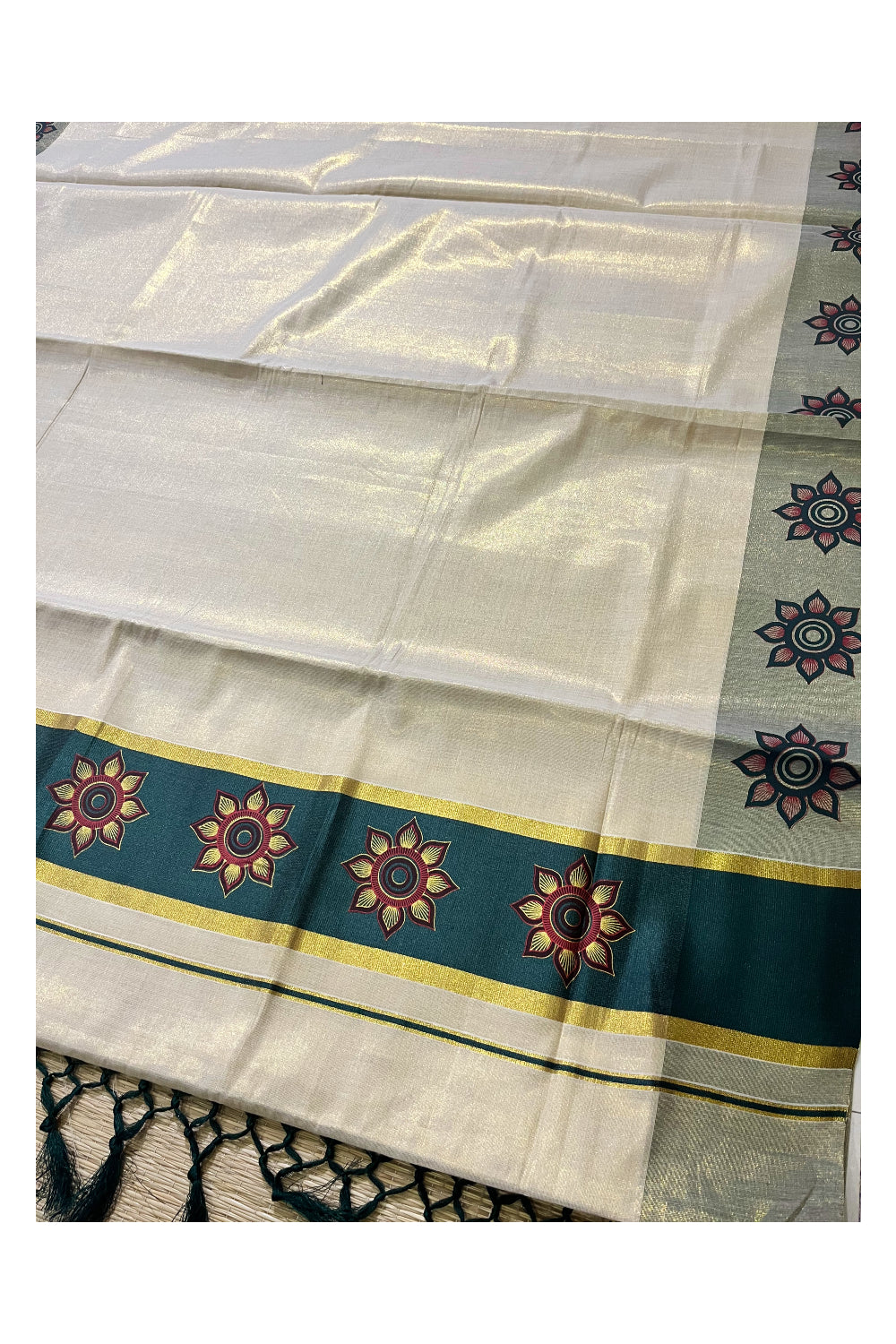 Kerala Tissue Kasavu Saree with Floral Block Prints in Dark Green Border