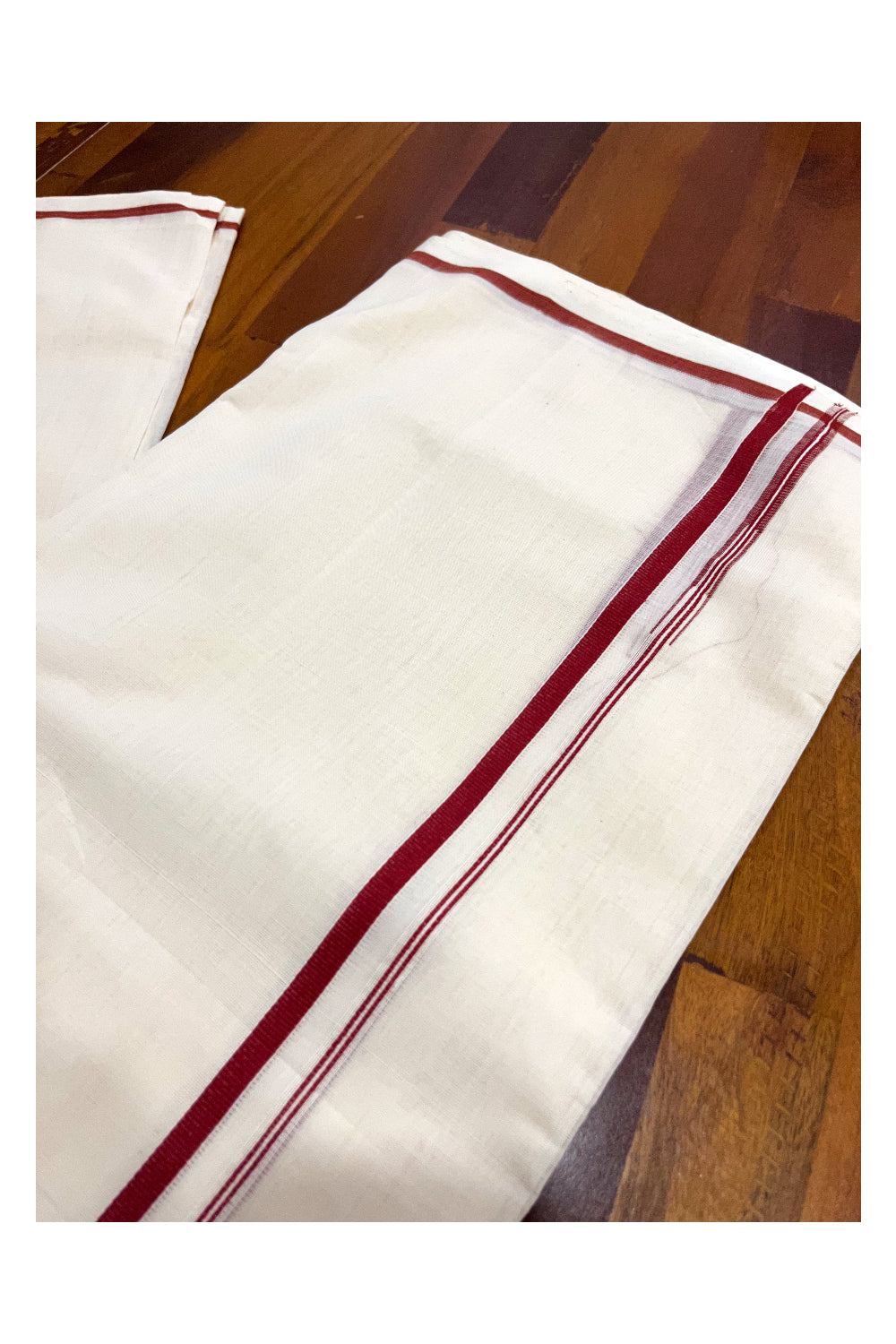 Southloom Premium Handloom Pure Cotton Mundu with Red Puliyilakkara Border (Onam Mundu 2023)