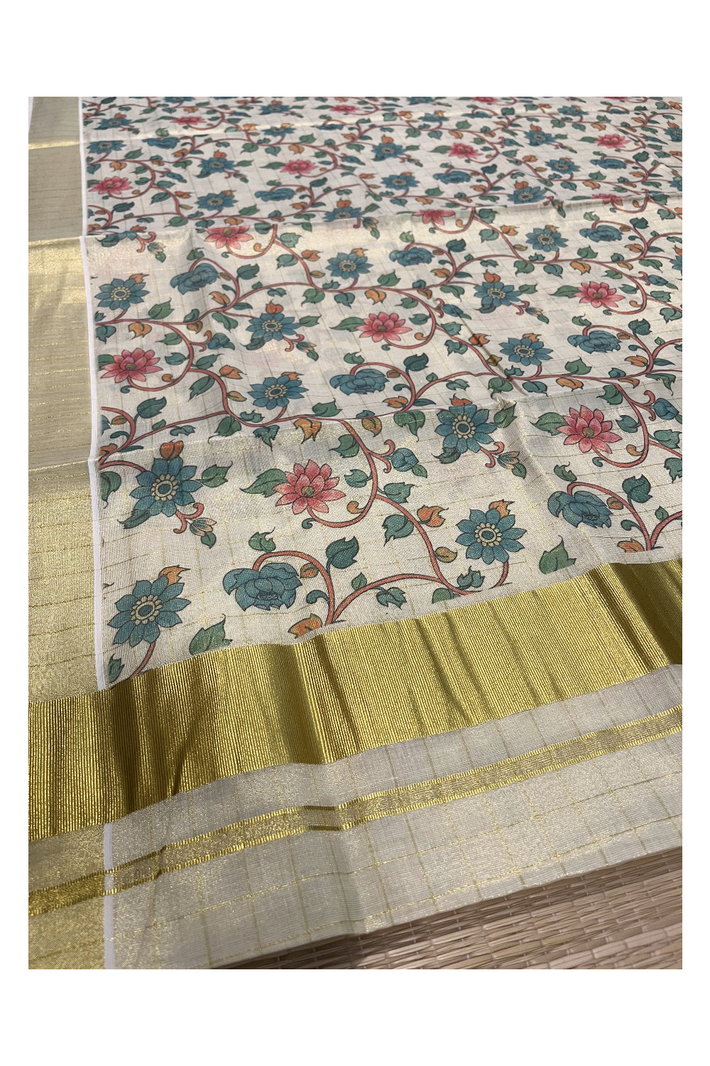 Kerala Tissue Kasavu Check Saree with Blue Floral Kalamkari Design