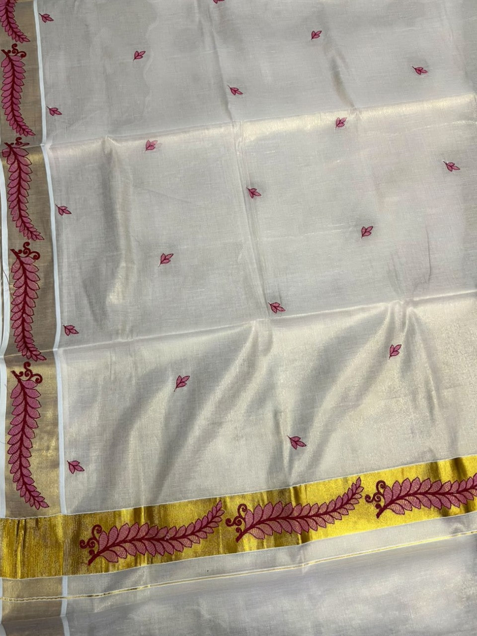 Southloom Tissue Kerala Kasavu Saree with Floral Embroidery Design On Border
