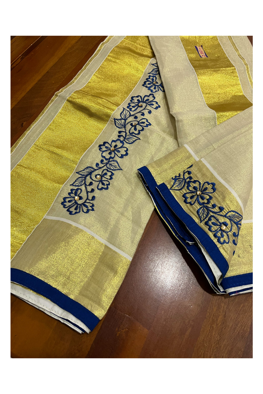 Kerala Tissue Kasavu Set Mundu (Mundum Neriyathum) with Handwork Embroidery Design and Blue Blouse Piece