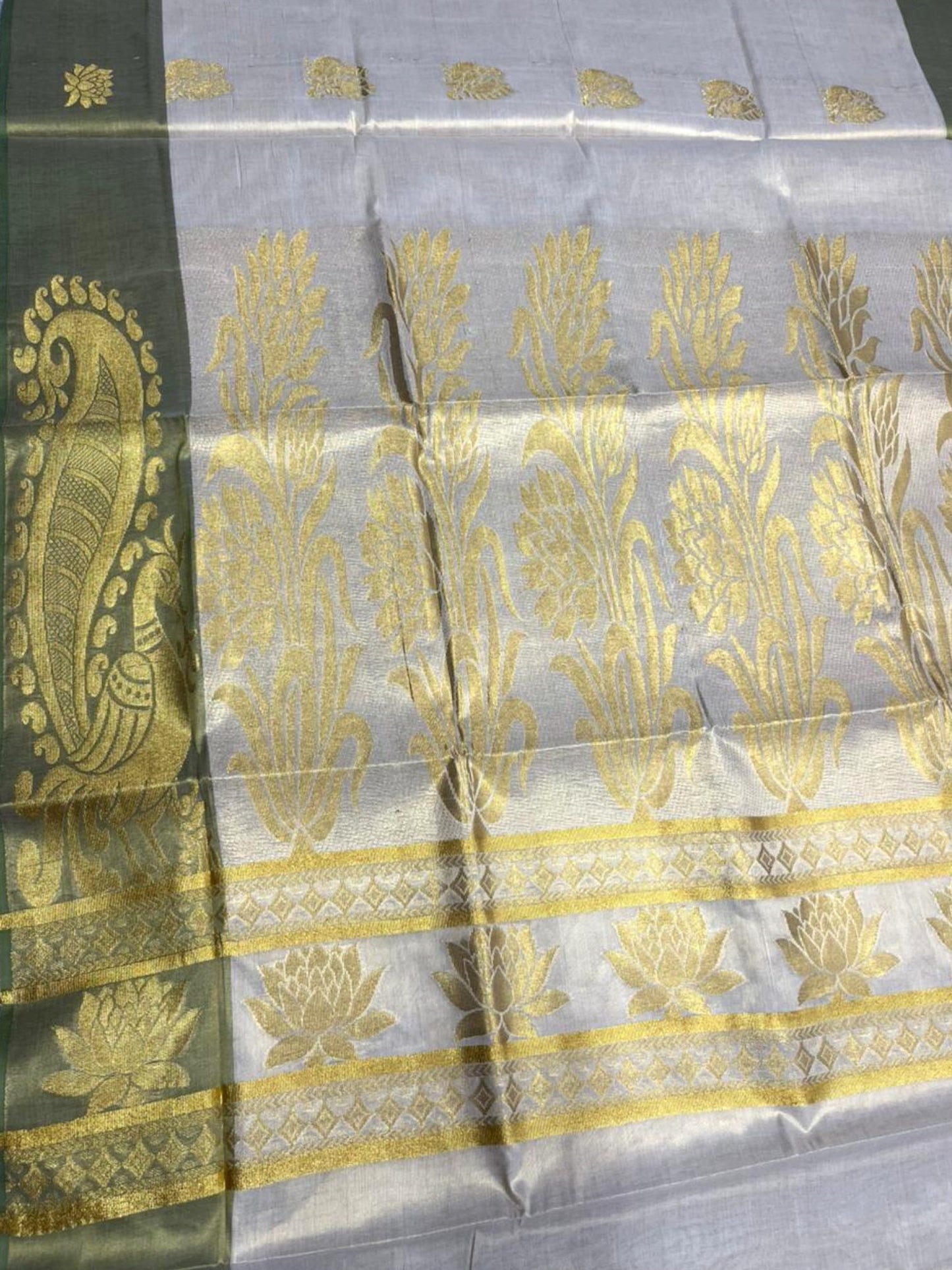 Southloom  Kerala Tissue Kasavu Heavy Work Saree with Peacock Design And Olive Green Border SL483