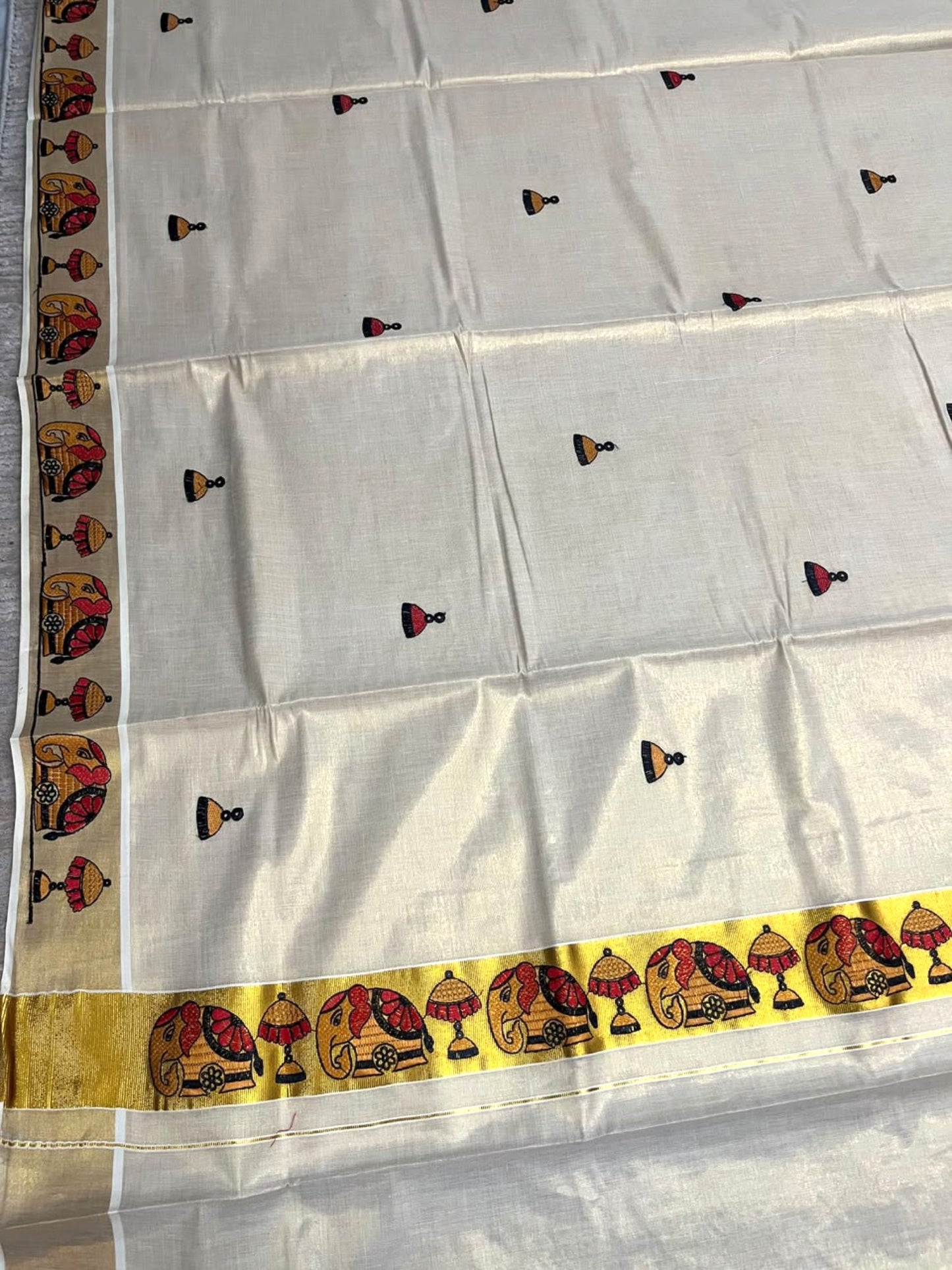 Southloom Tissue Kerala Kasavu Saree with Elephant Embroidery Design