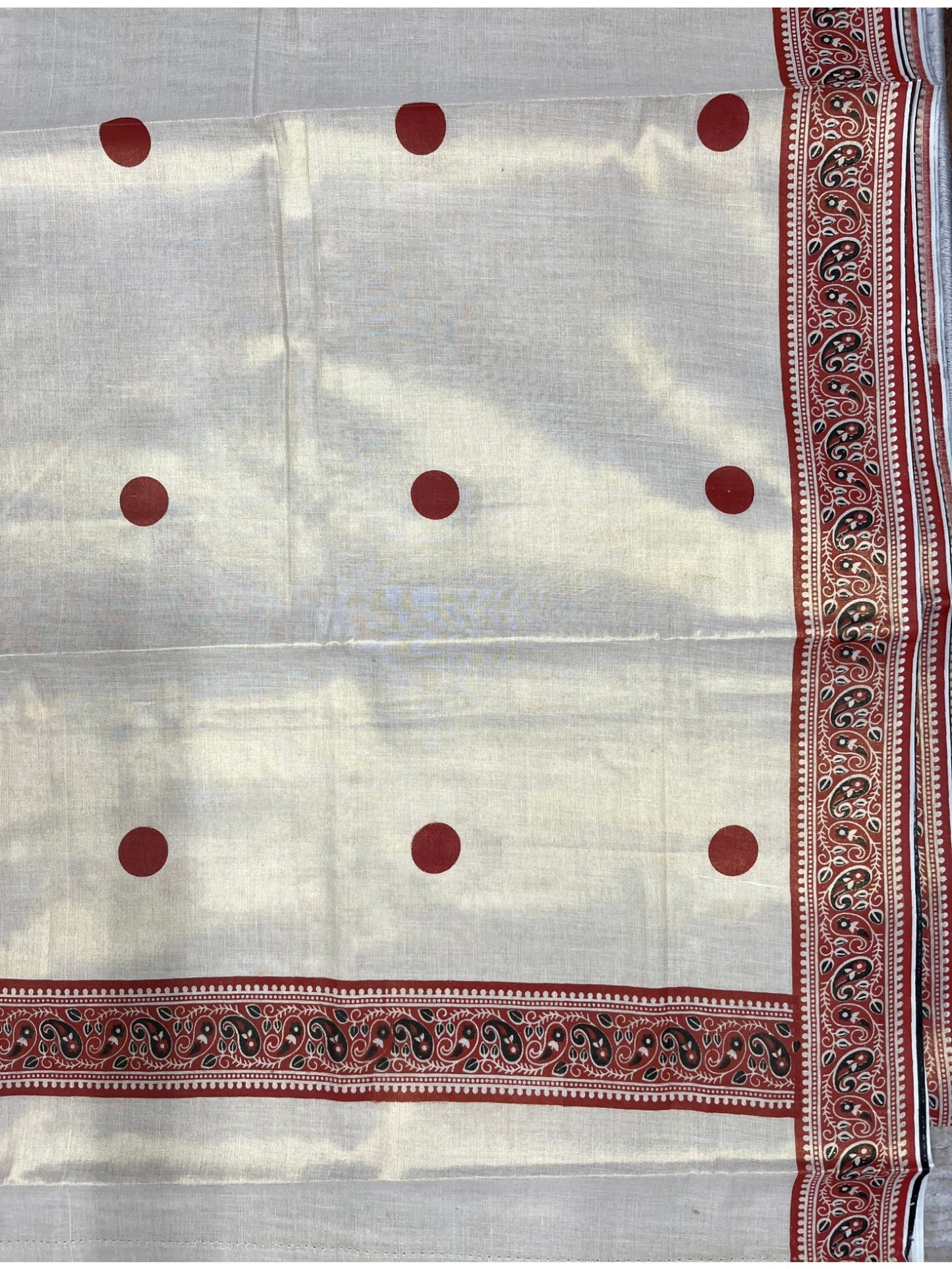 Southloom Kerala Tissue Plain Saree With Orange Polk Dots on Body and Floral Digital Prints in Borders