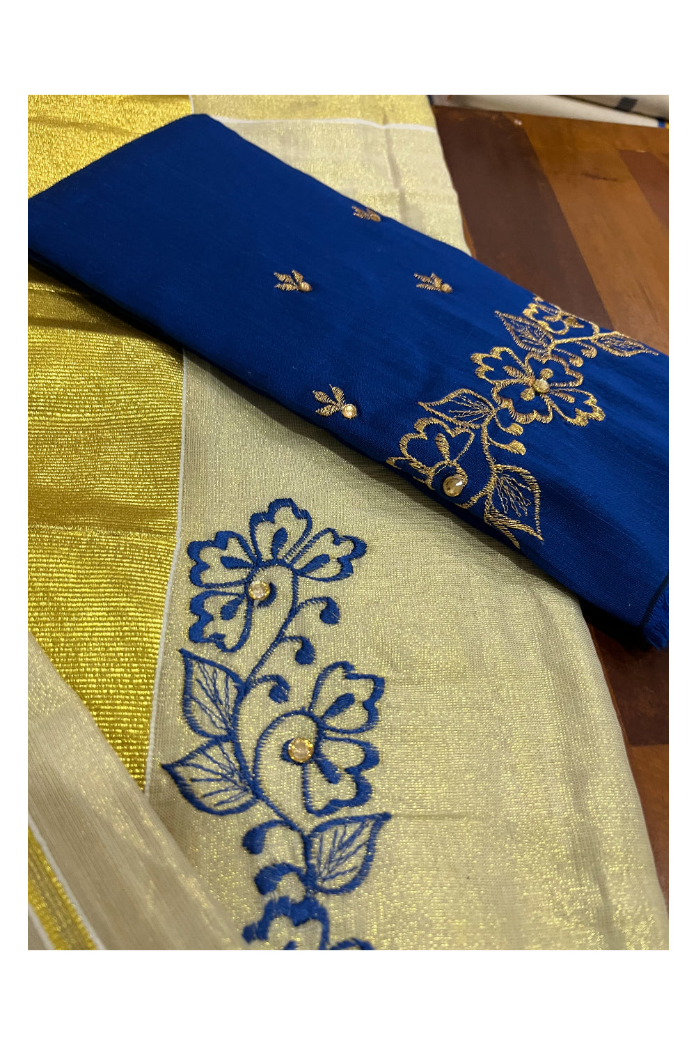 Kerala Tissue Kasavu Set Mundu (Mundum Neriyathum) with Handwork Embroidery Design and Blue Blouse Piece