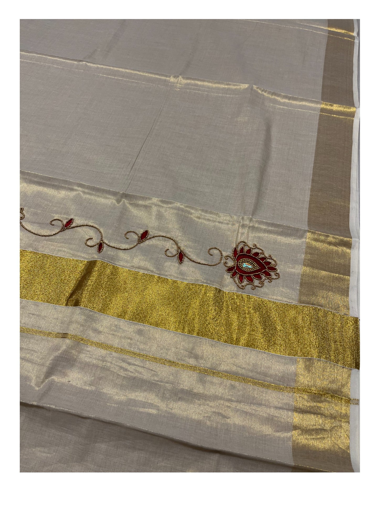 Kerala Tissue Kasavu Saree with Floral Embroidery and Sequins Work on Body