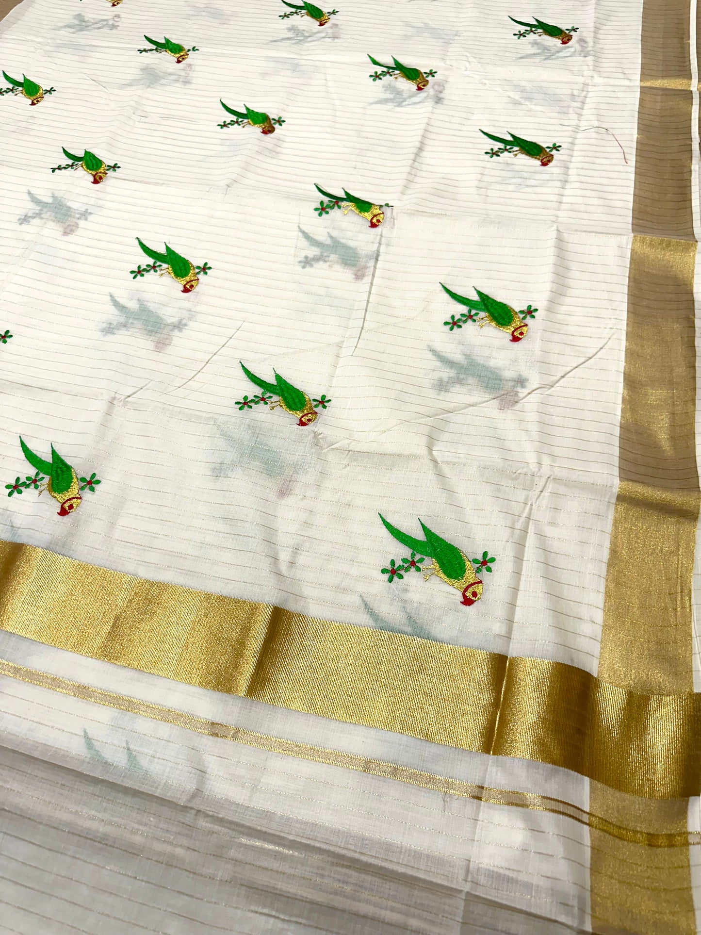 Southlooom Parrot Embroidery Kasavu Kerala Saree with Lines Across Body 🦜