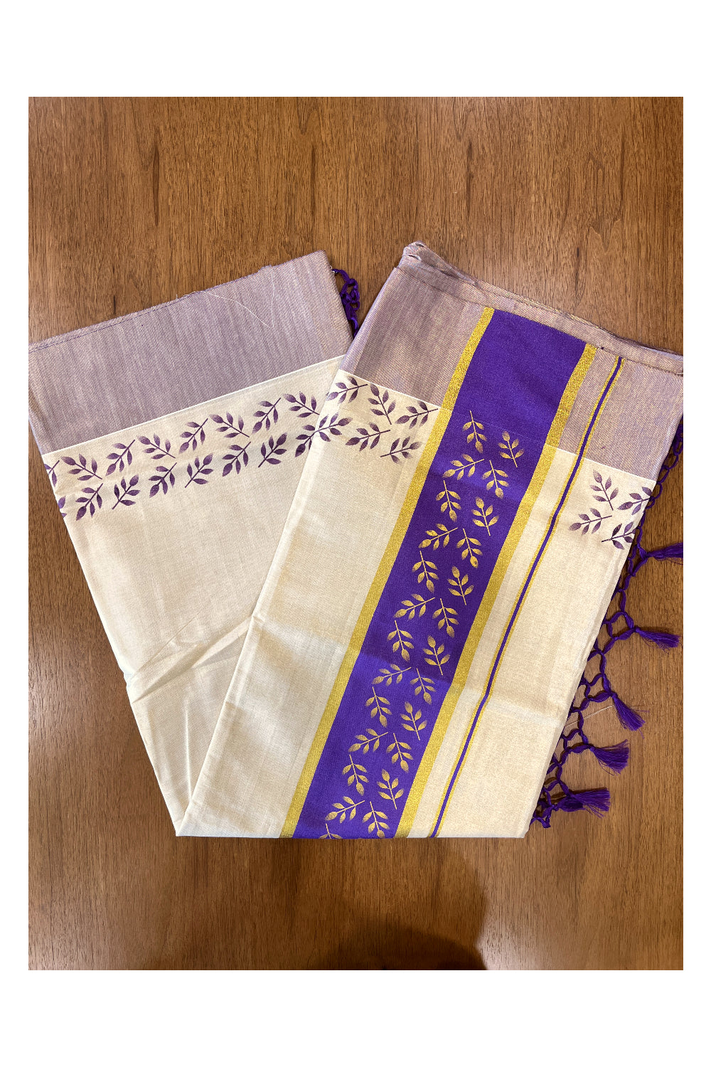 Kerala Tissue Kasavu Saree with Golden and Violet Block Prints on Border and Tassels Works