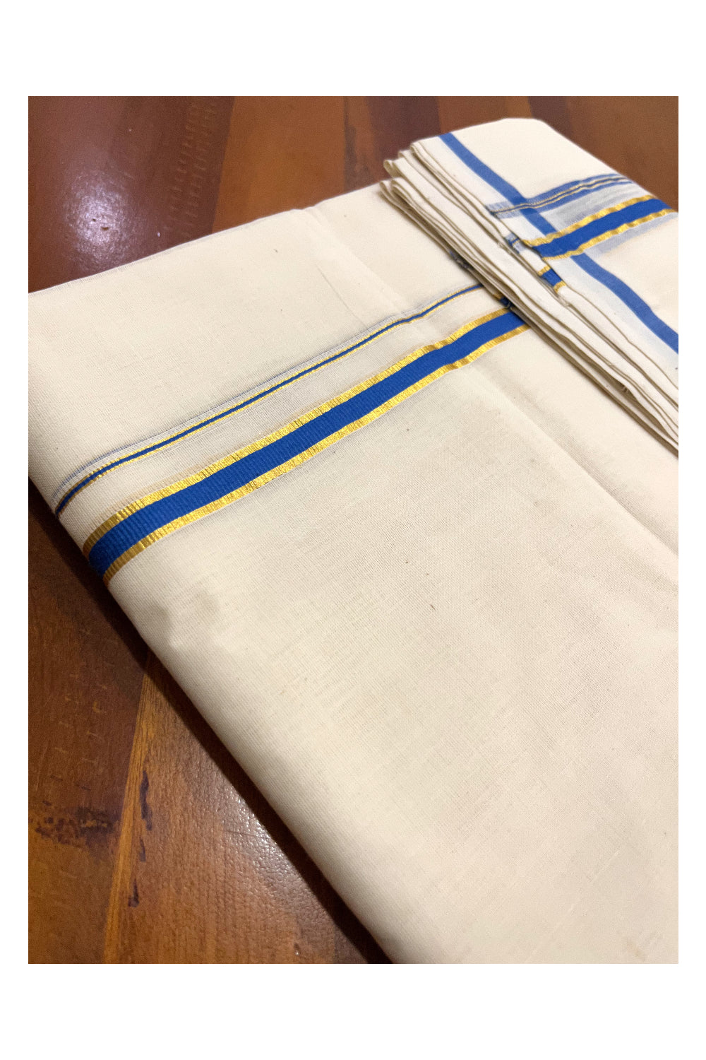 Southloom Premium Handloom Pure Cotton Mundu with Blue Puliyilakkara Kasavu Border (Onam Mundu 2023)