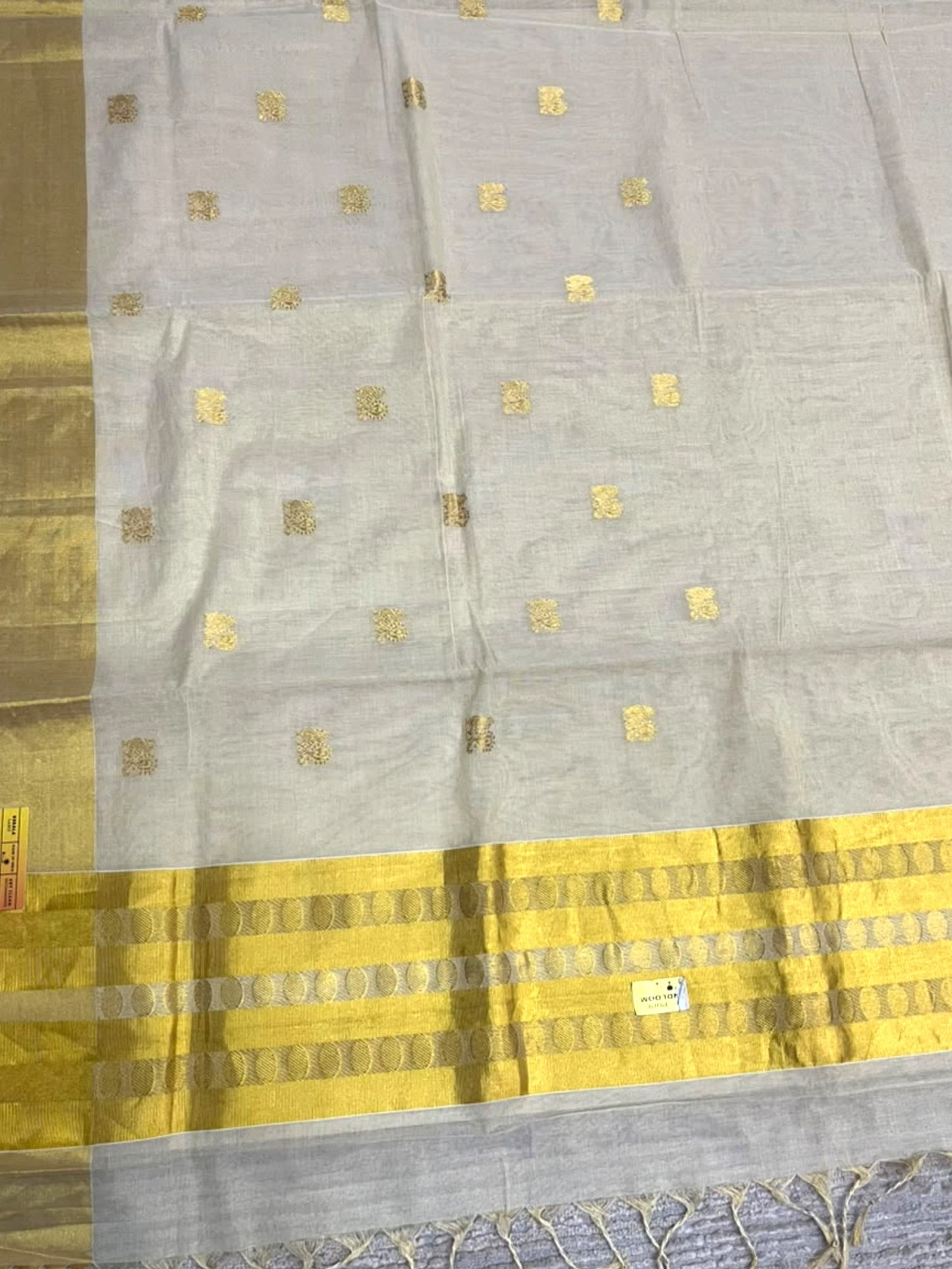 Southloom Super Premium Balaramapuram Handloom Tissue Saree with Golden Butta Work and Gold Polka Kasavu Border