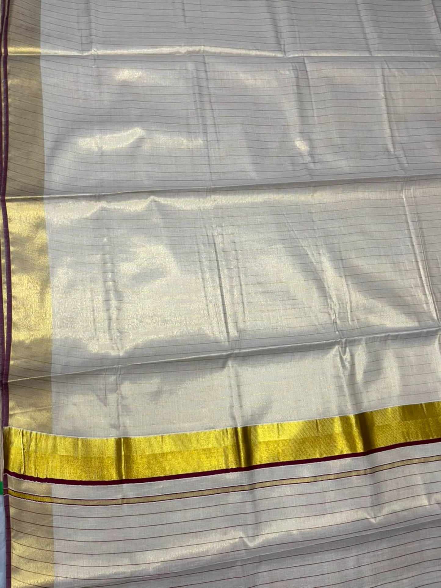 Southloom Kerala Tissue Kasavu Saree with Stripes on Body In Maroon Border