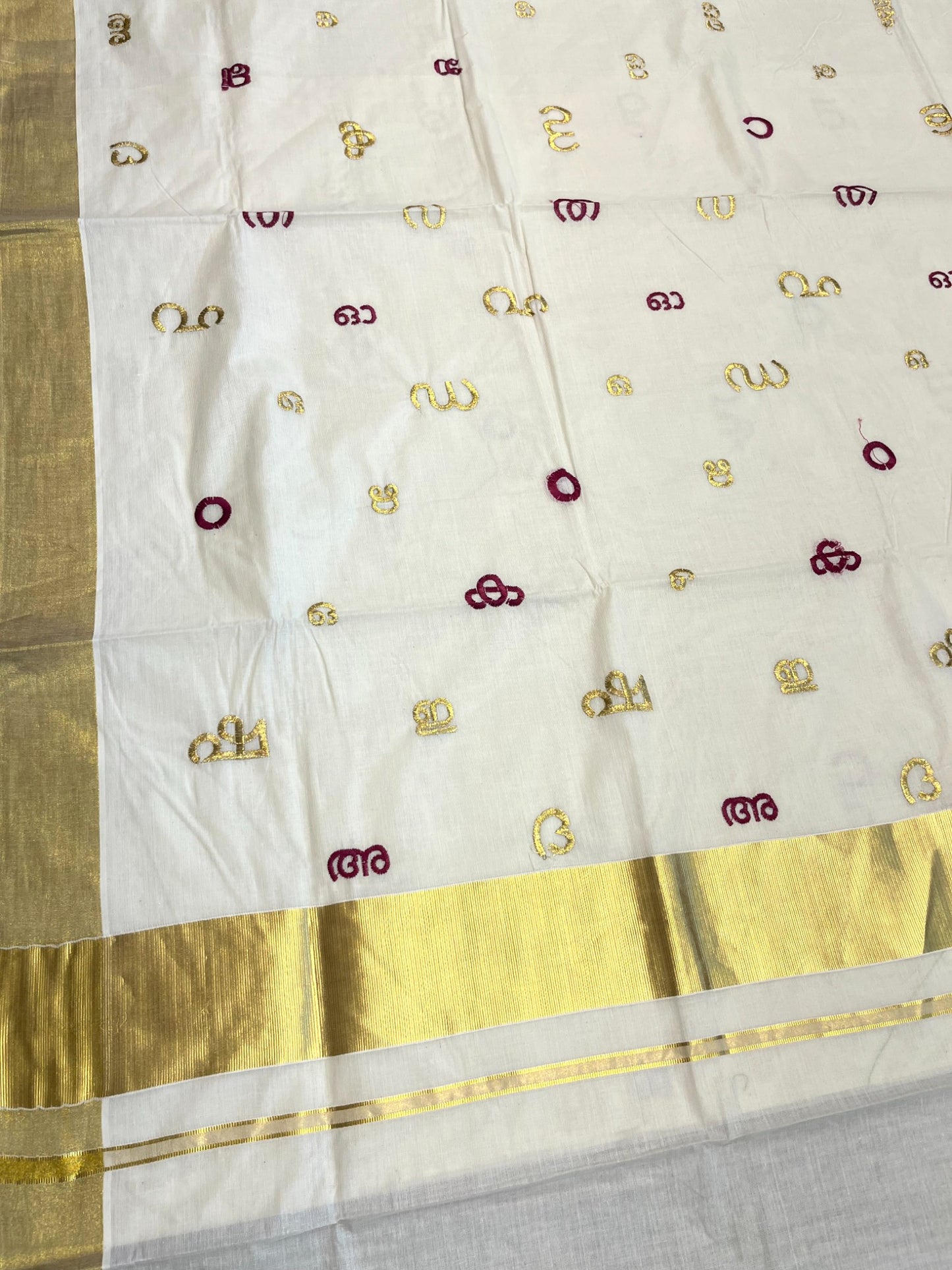 Southloom Kerala Cotton Kasavu Saree with Gold and Magenta Malayalam Aksharamala Embroidery Work on Body