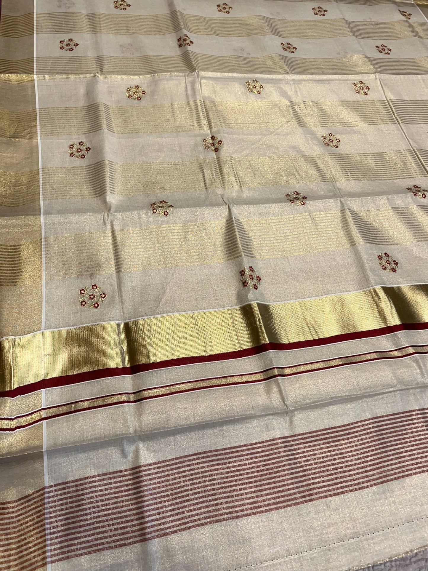 Kerala Tissue Kasavu Stripes Saree with Maroon and Gold Embroidery Design on Body