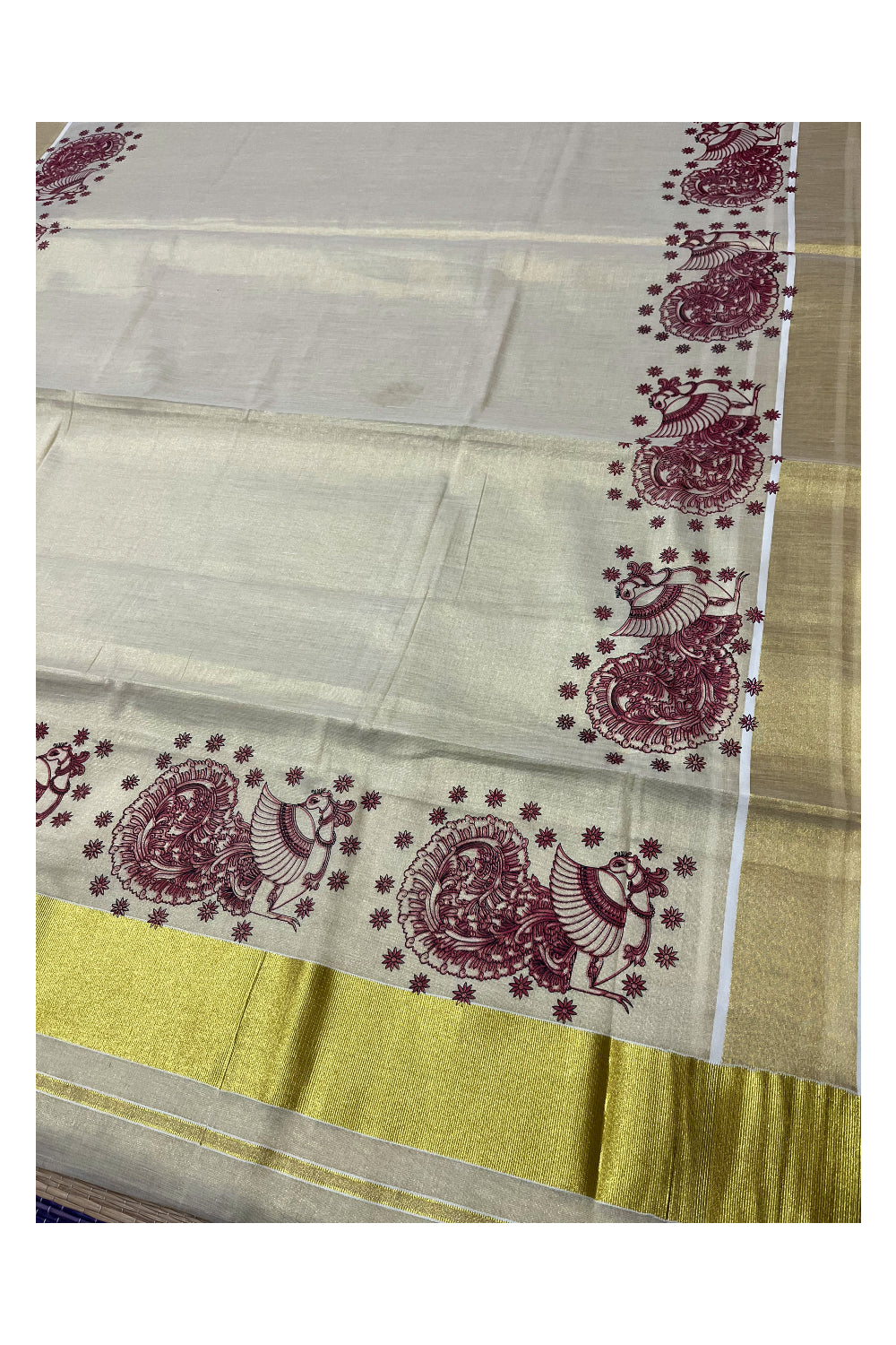 Kerala Tissue Kasavu Saree with Pink Peacock Block Printed Designs