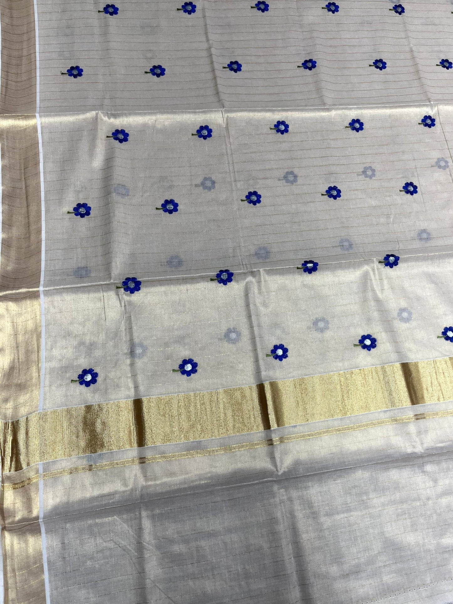 Southloom Kerala Tissue Kasavu Lines Saree with Blue Floral Embroidery Work on Body