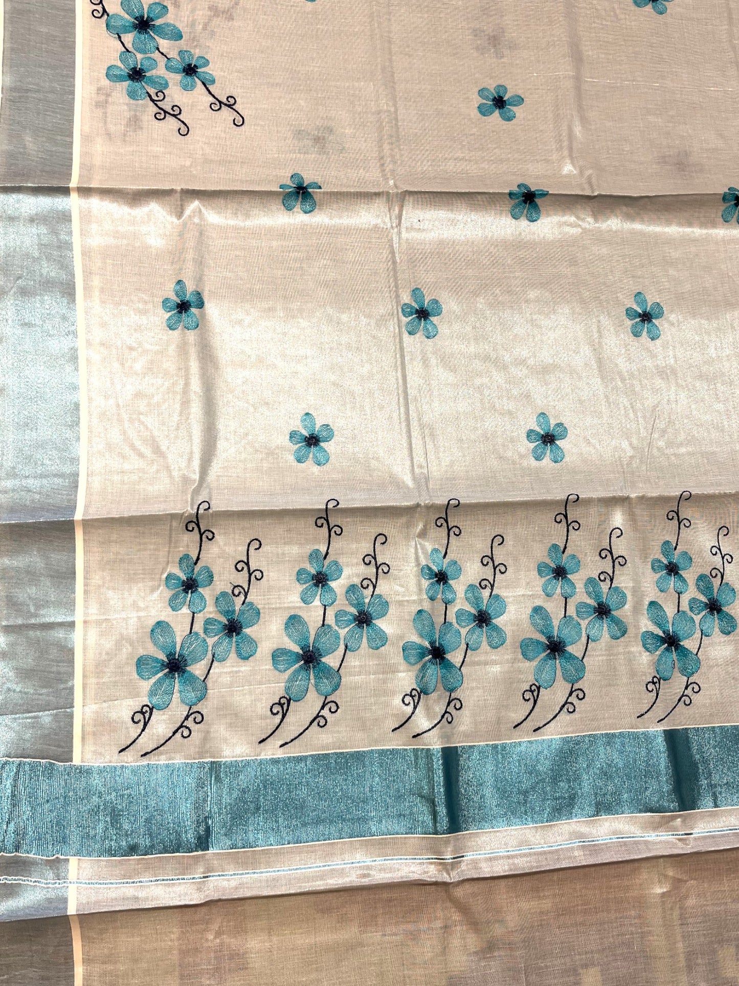 Southloom Kerala Tissue Kasavu Saree with Blue Floral Embroidery on Body and Border